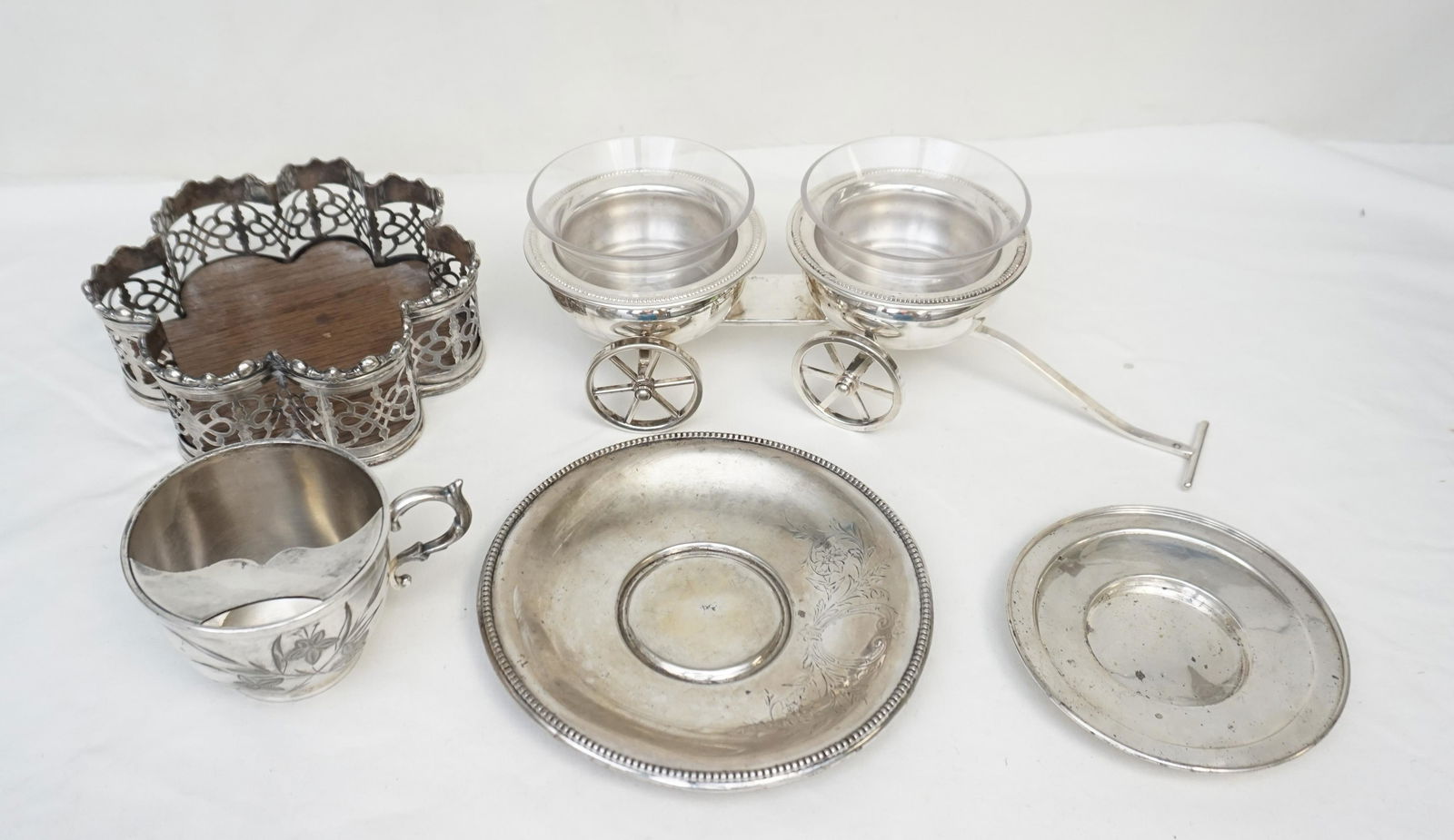 5 PC ANTIQUE & VINTAGE SILVERPLATE + STERLING: 1- Antique Silver on Copper Wine Coaster. 2- Antique Barbour Silver Quadruple Plate Moustache Cup and Underplate. 3- F.B. Rogers Condiment Wagon with plastic inserts. 4- Small Sterling Plate 5 3/4". W