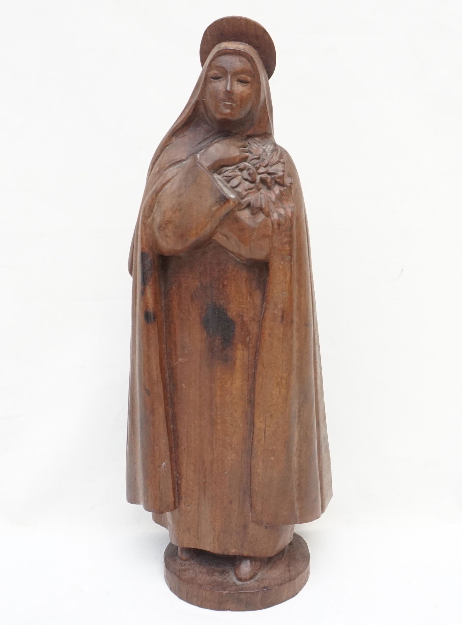 HAND CARVED WALNUT MADONNA SIGNED AFF: Antique / Vintage Hand Carved Walnut Madonna with Flowers. Initialed one side AFF. 4"x3 1/4"x10 1/2". 100% of the Hammer Price will benefit Charleston's Daughters of St. Paul, Roman Catholic Sisters.