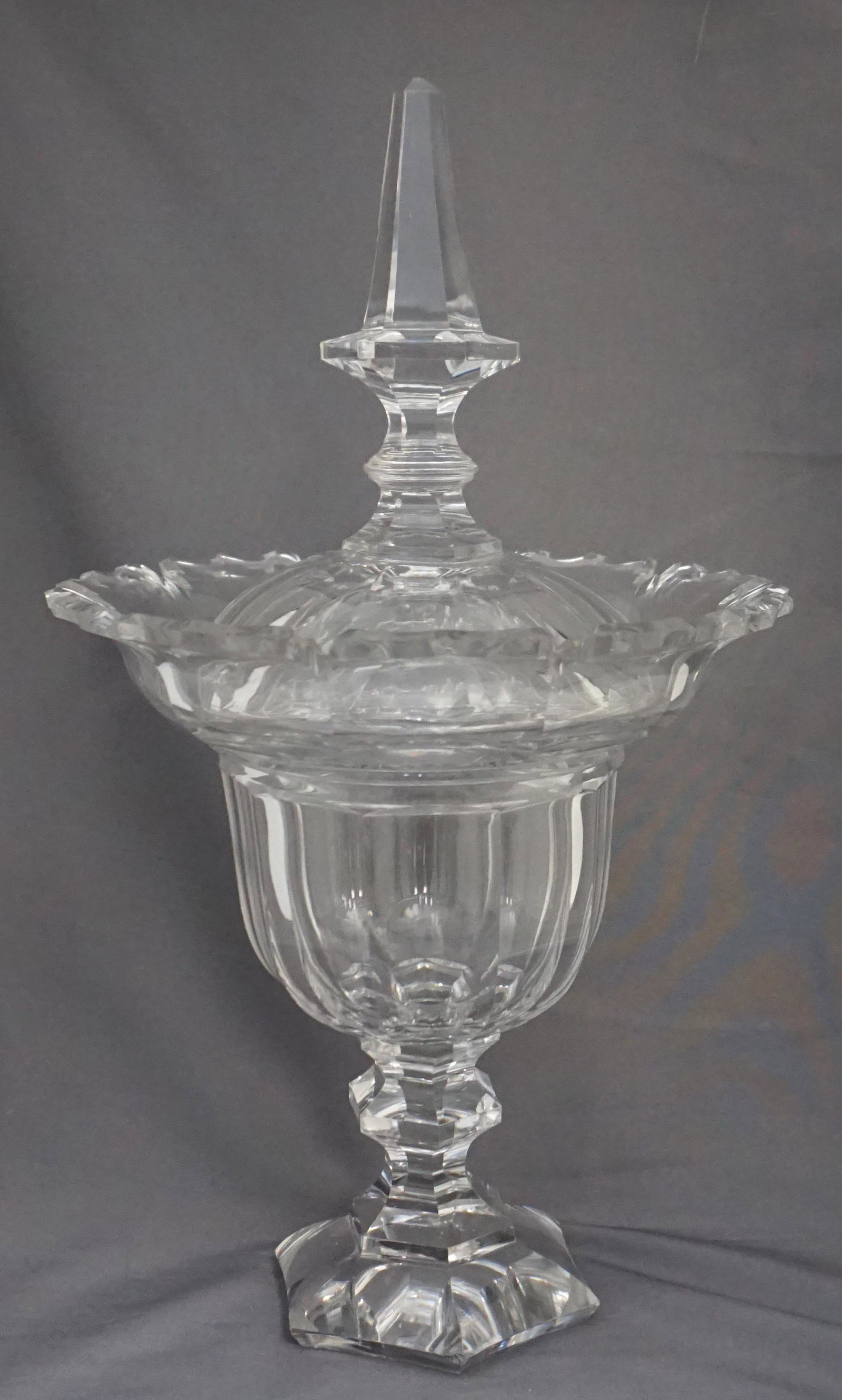 GEORGIAN CUT GLASS COVERED SWEETMEAT COMPOTE: A Large Antique Georgian Cut Glass Covered Covered Sweetmeat Jar. Minor nicks to outer teeth. Measures 8 3/4"x8 3/4"x15". Weight 5 pds 9 oz. PROVENANCE: The Estate of Dr. Fraser Wilson, Charleston SC.