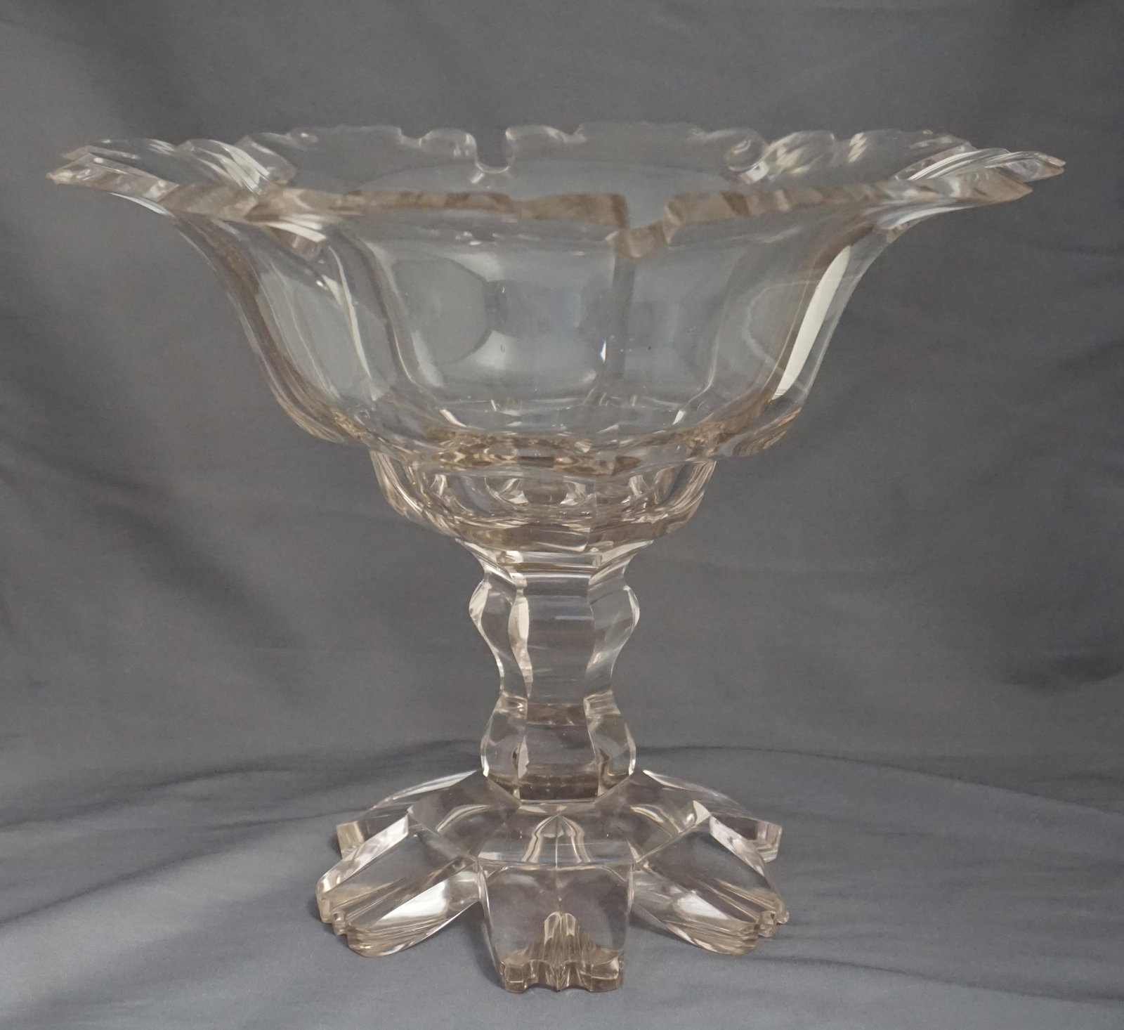 GEORGIAN CUT GLASS SWEETMEAT COMPOTE: A Large Antique Georgian Cut Glass Sweet Meat Compote c. 1800. Minor nicks to outer teeth, 1 foot with polished chip. Measures 11 1/2"x11 1/2"x9 1/2". Weight 4 pds 9 oz. PROVENANCE: The Estate of Dr. 