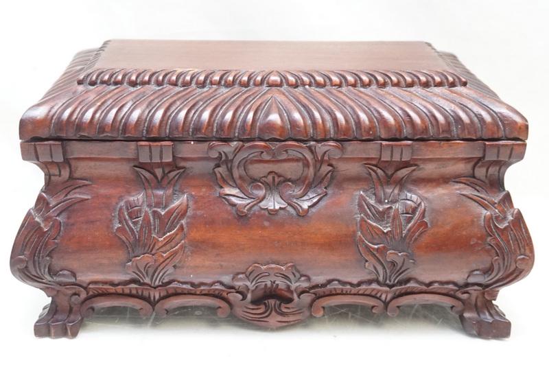 CARVED MAHOGANY BOX: Late 20th c. Carved Mahogany Box on Carved Feet. Measures 13 1/2"x8"x7". Weight 4 pds 9 oz. PROVENANCE: A Charleston SC Private Estate.