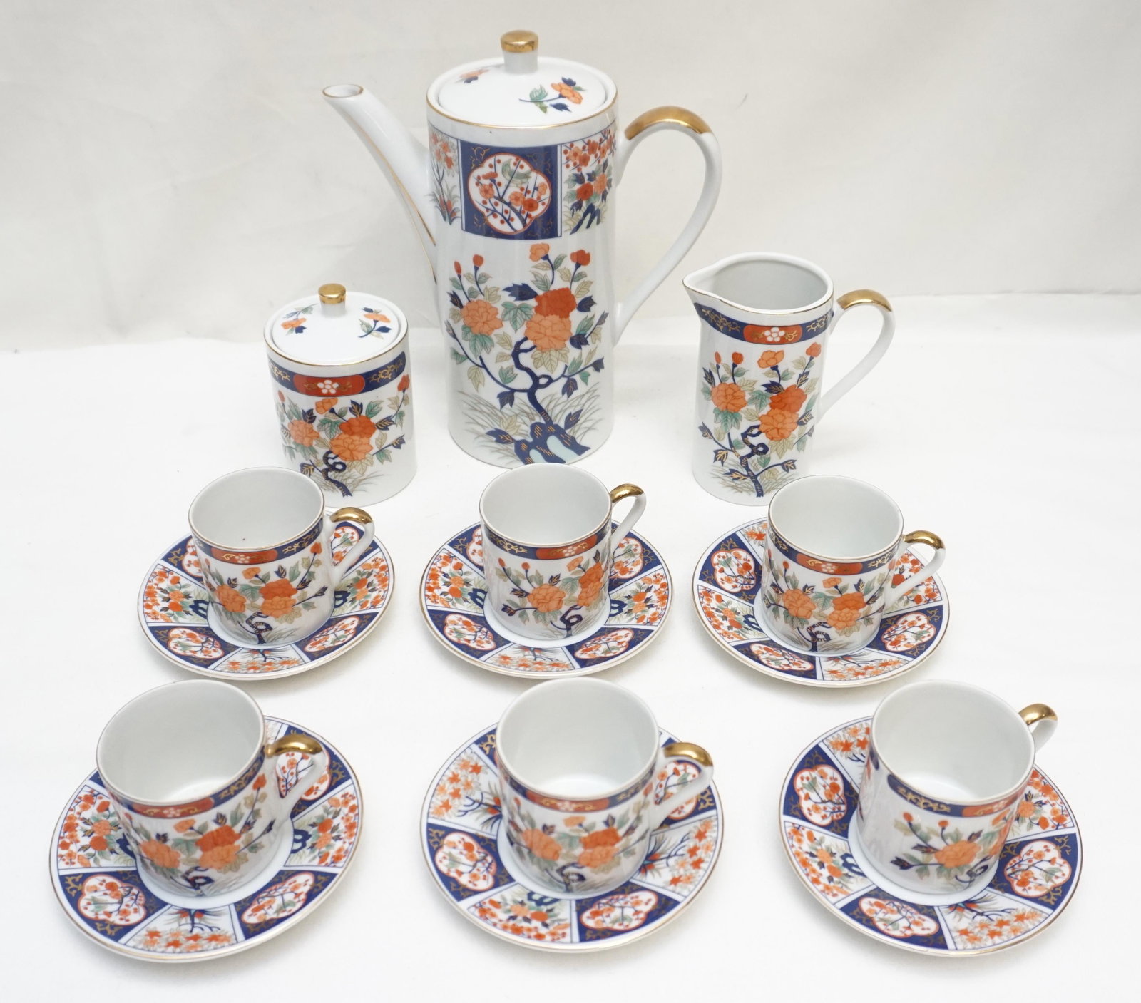 ANDREA BY SADEK IMARI DEMITASSE SET: Vintage Andrea by Sadek Made in Japan Imari Porcelain Demitasse / Espresso Set , Service for 6. Coffee Pot 8 1/4". Cream and Sugar, lid to sugar has been glued, 6 cups and 6 saucers. Weight on all 3 p
