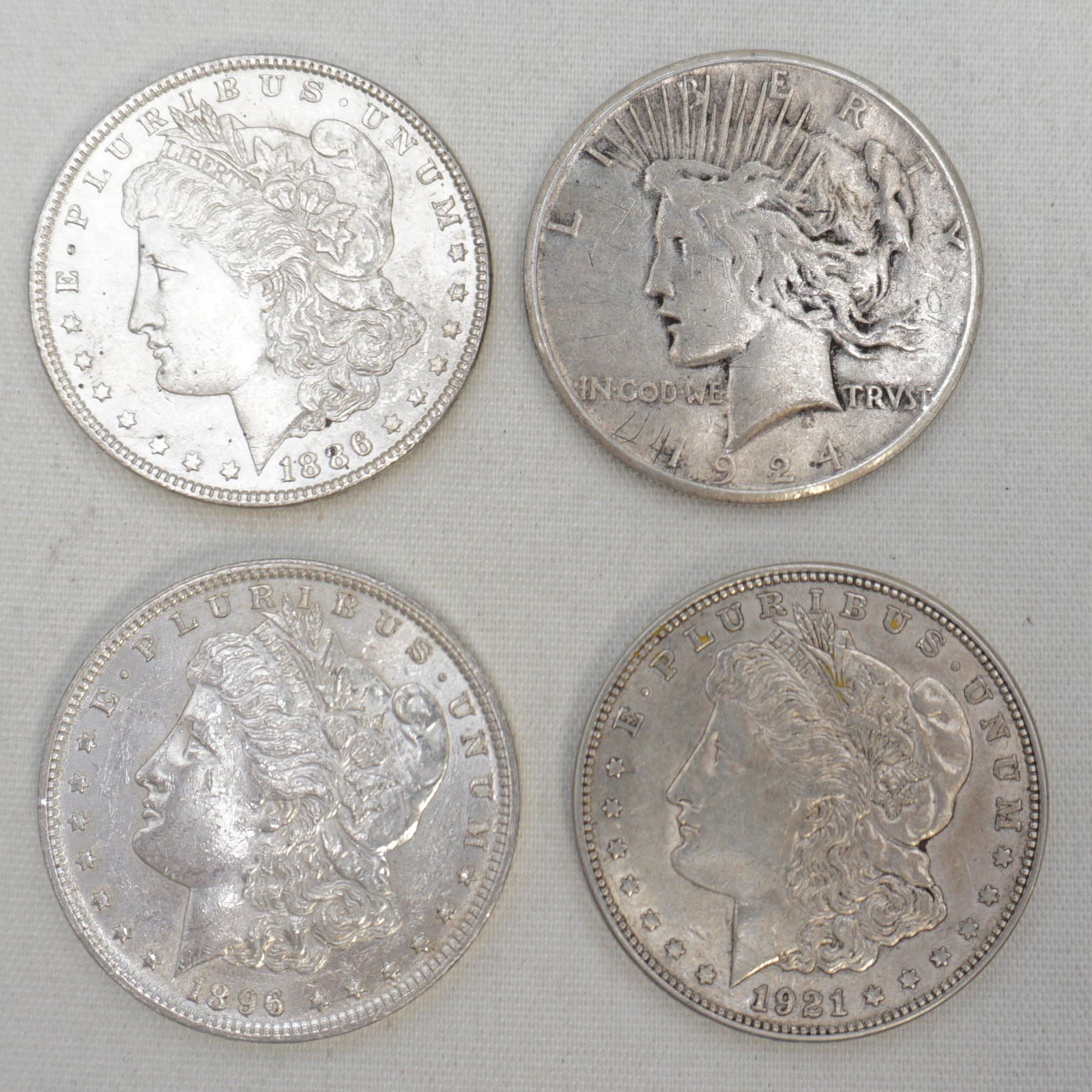 3 MORGAN and 1 PEACE SILVER DOLLARS (1 of 4)