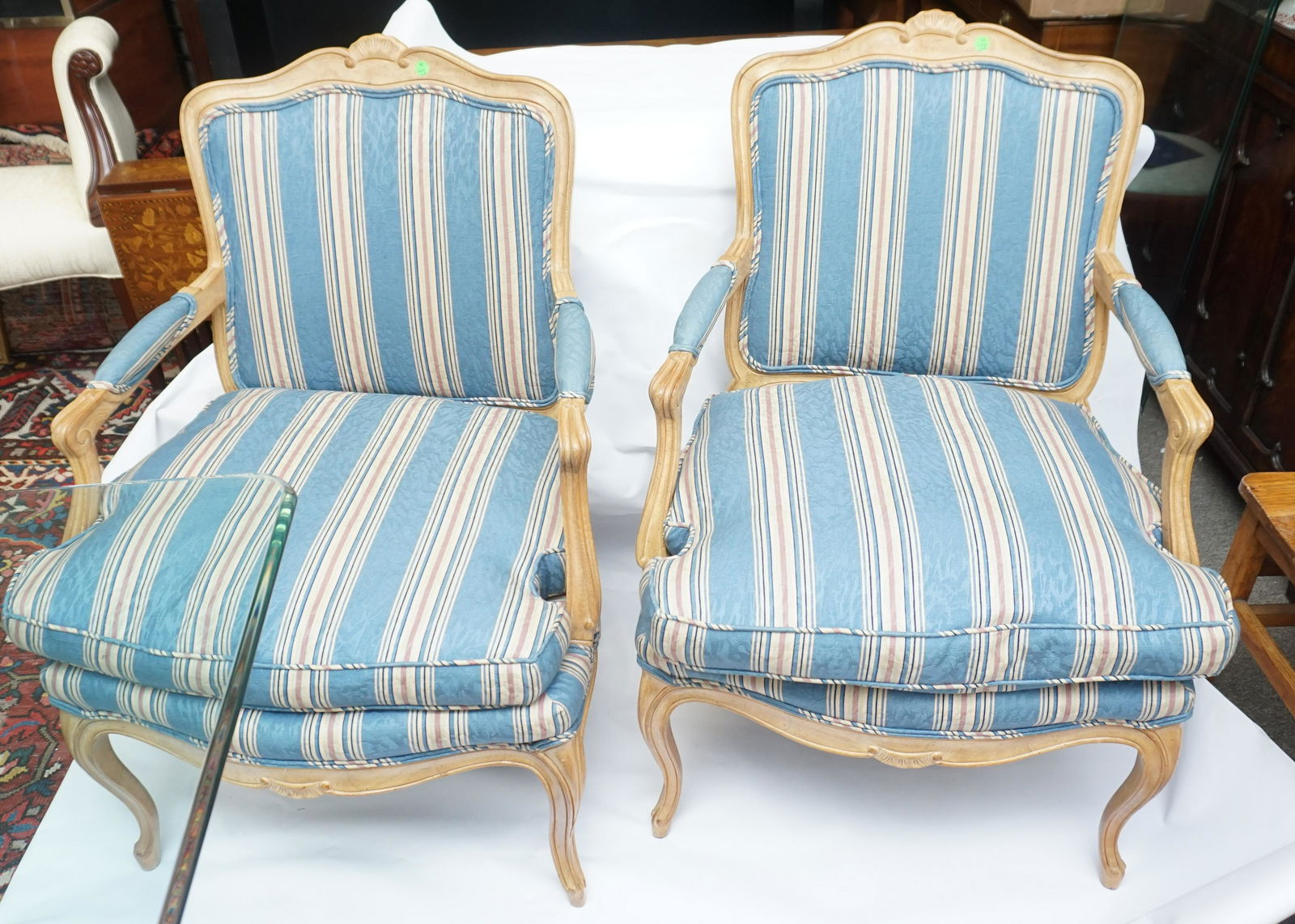 PAIR CARVED UPHOLSTERED ARM CHAIRS (1 of 7)