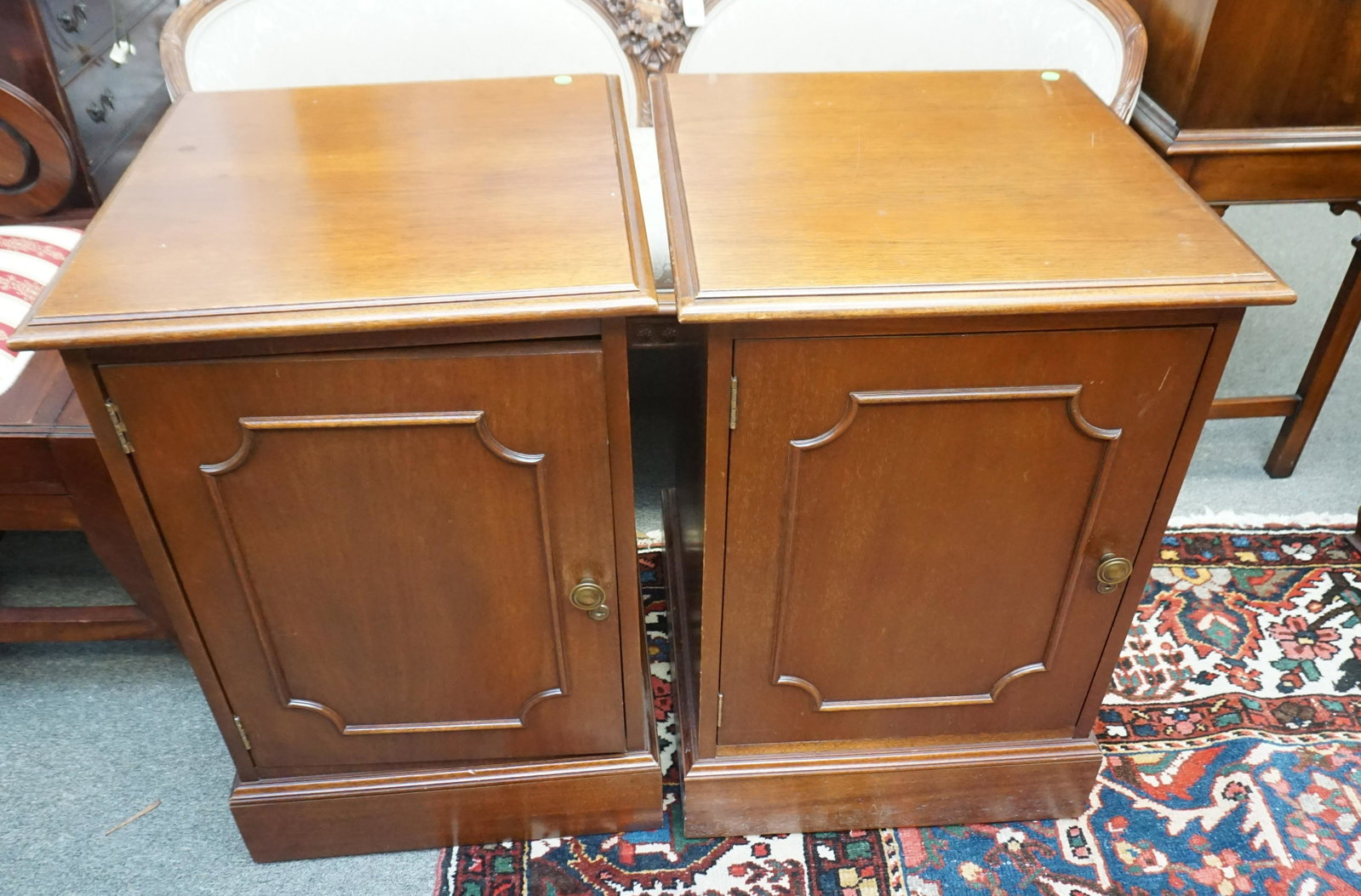PAIR MAHOGANY NIGHTSTAND CABINETS: Matched Pair of Mahogany Nightstand / Cabinets. Each measures 20"x21"x29 1/2". NO IN HOUSE SHIPPING. PROVENANCE: A Private Charleston SC Estate.***Pickup only or Shipping on this item offered through 