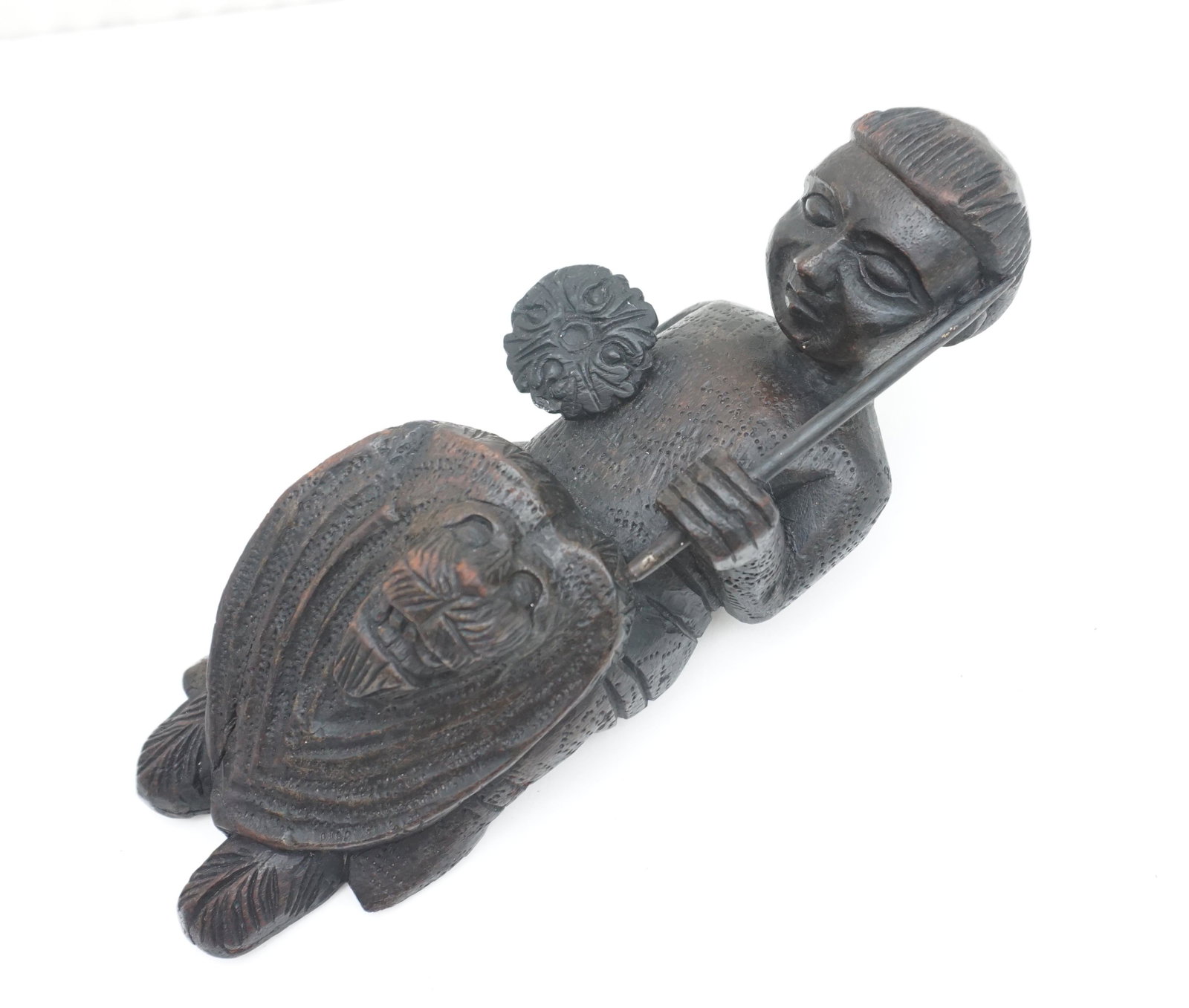 HAND CARVED WARRIOR SCULPTURE ON LION: Antique wall mount Hand Carved Warrior on Lion. Measures 12". Weight 1 pd 10 oz. PROVENANCE: A Private Charleston SC Estate