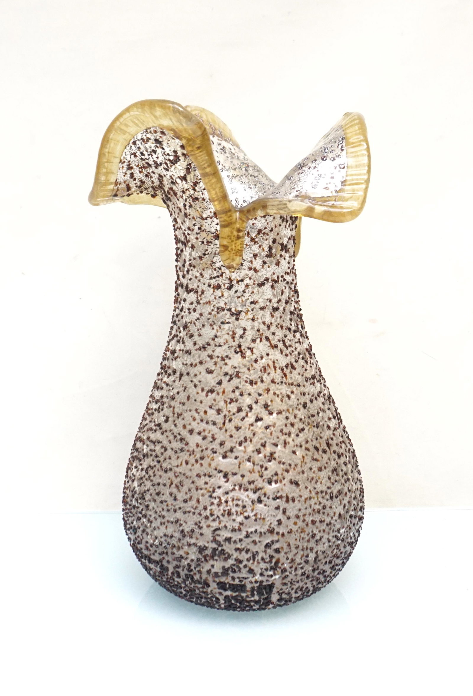 VINTAGE ITALIAN ART GLASS VASE: Italian art glass vase with textured surface in the manner of Ercole Barovier, Barbarico Series, Barovier & Toso; cut and folded rim accented with a applied amber ribbon. Measures 5"x5"x11". Weight 3 