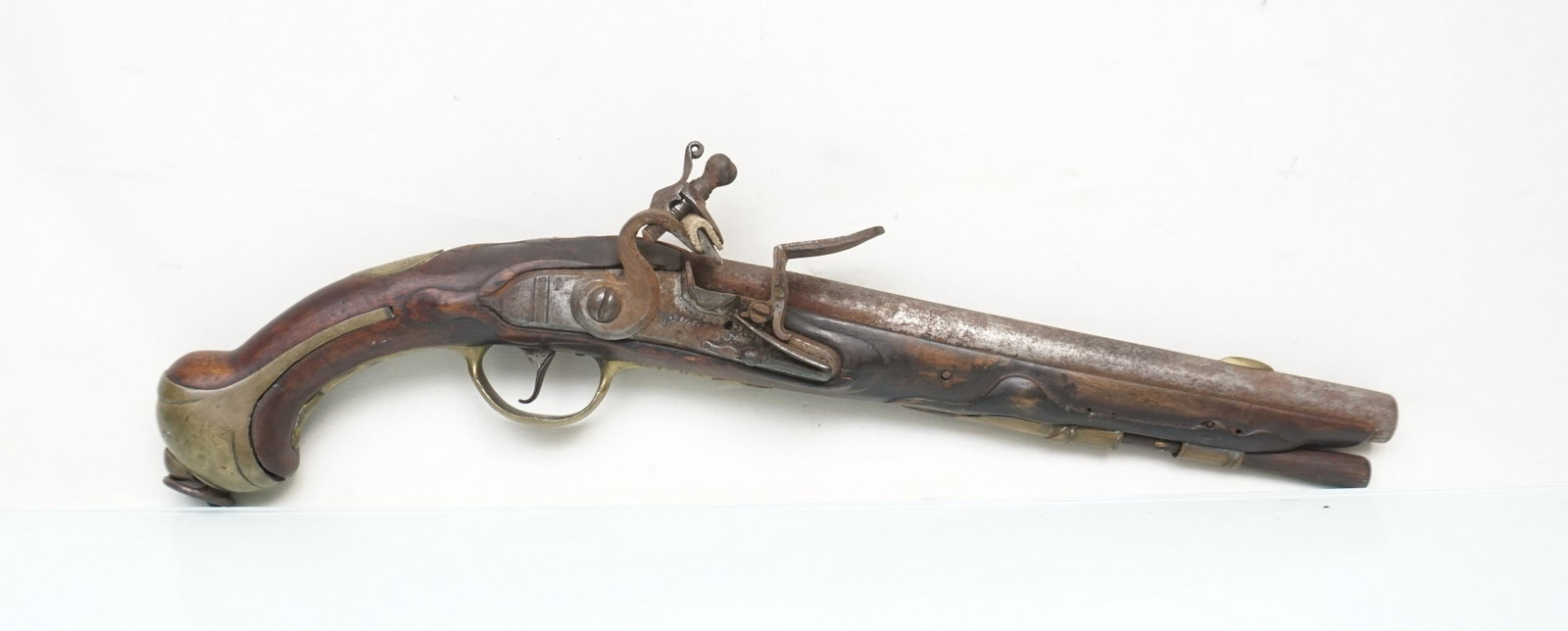 POTZDAM MAGAZ PRUSSIAN FLINTLOCK PISTOL: Large, Prussian flintlock pistol, marked PaTZDAM MAGAZ on lockplate. They continued in production until just before the turn of the nineteenth century and saw service in several major European conflic