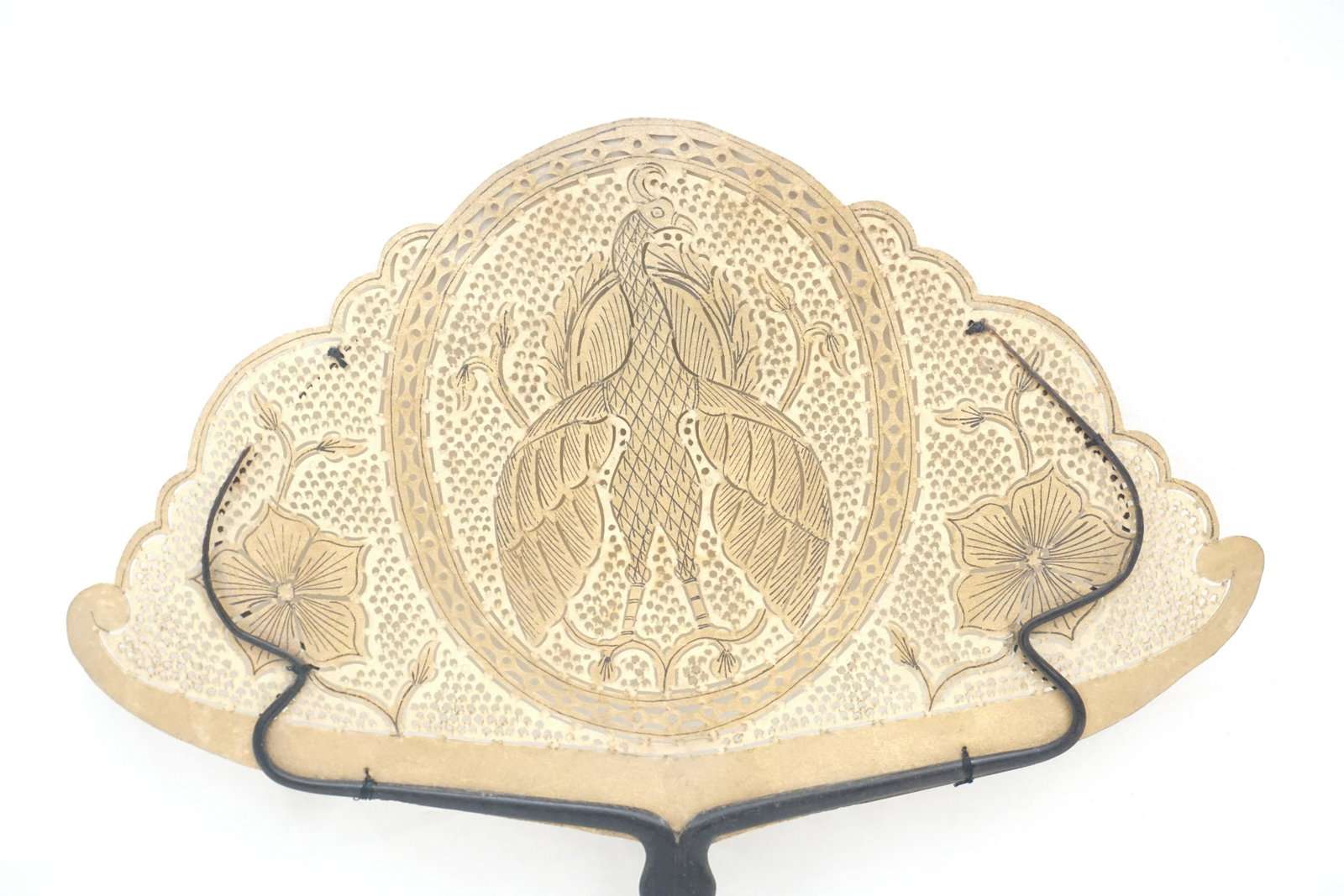 ANTIQUE JAVA BUFFALO HORN & HIDE FAN: Antique Buffalo Horn and Buffalo Hide Fan from Java, first quarter 20th c. Delicate Pierced and Painted Buffalo Hide with Phoenix and Flowers with Carved Buffalo Horn Handle. Measures 10"x10". PROVENA