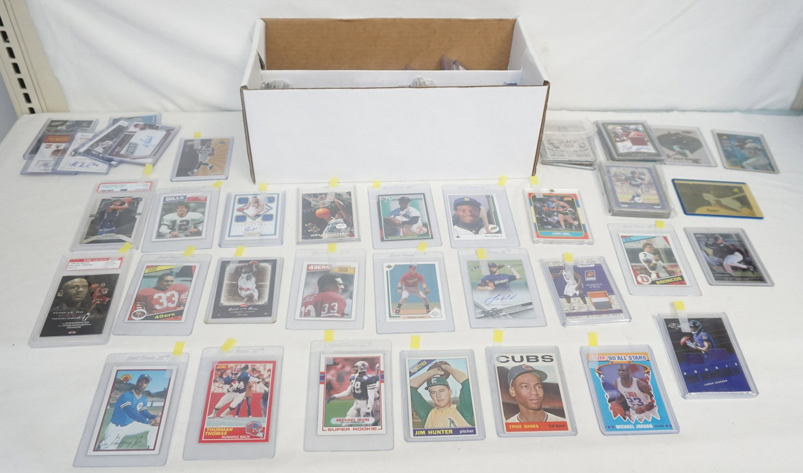LARGE GROUP BASEBALL,BASKETBALL, FOOTBALL CARDS: Large grouping of Vintage Sports Cards. To include Vintage Basketball - 1990 Fleer All Star HOF players; other various stats, Vintage Baseball - 1989 Upper Deck and Bowman Ken Griffey Jr Rookie and ol