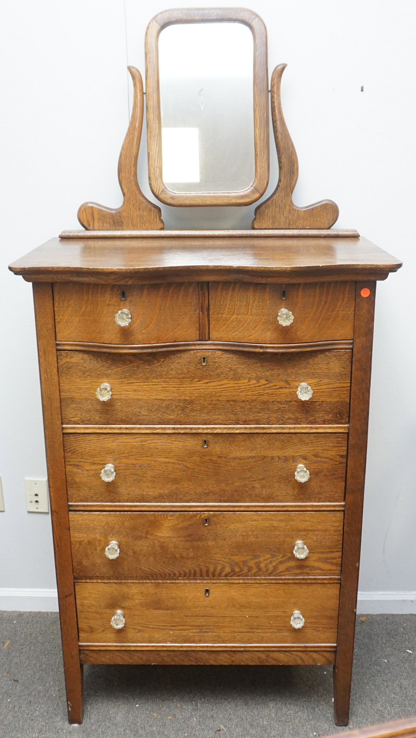 ANTIQUE AMERICAN TIGER OAK DRESSER: Antique American Tiger Oak Dresser with SwIng Mirror. Measures 32 1/2"x19 1/2"x48 1/2" (Without Mirror) Mirror additional 23". NO IN HOUSE SHIPPING. PROVENANCE: A Private Charleston SC Estate.***Picku