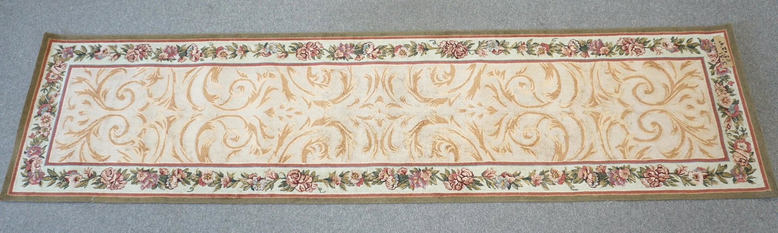 VINTAGE STARK NEEDLEPOINT WOOL RUNNER: Vintage Stark Needlepoint Wool Runner. Scrolls & Floral Border. Measures 2'9" x 11'3". Stark Carpet was founded in 1928 in New York City. PROVENANCE: A Private Charleston SC Estate.