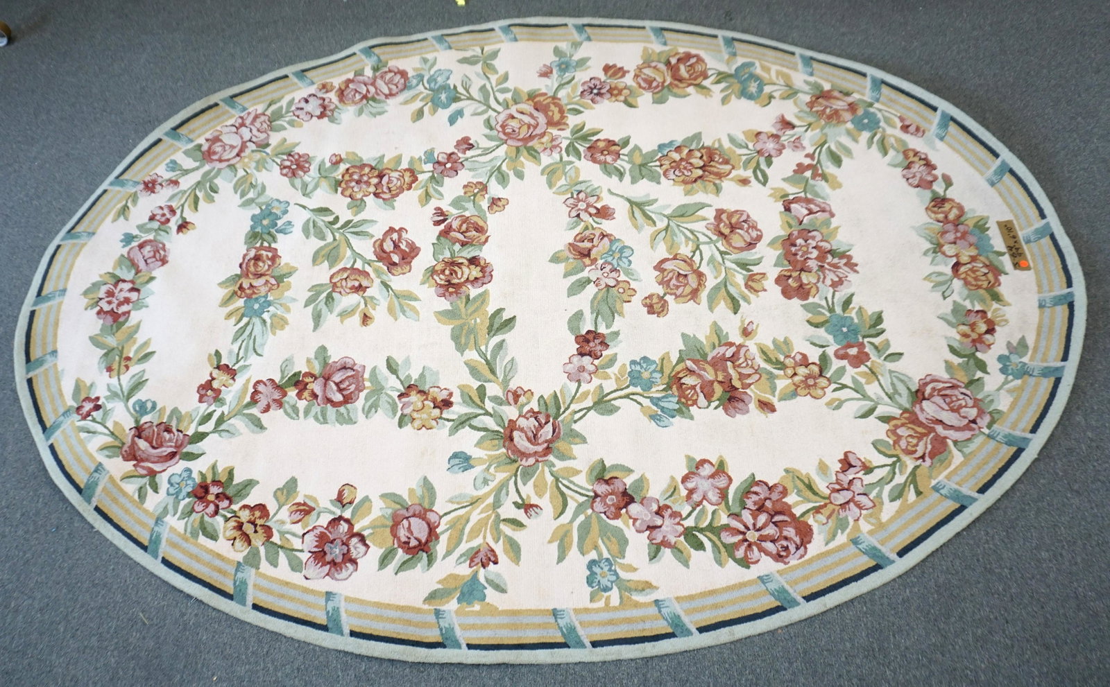 VINTAGE LARGE 9 FT OVAL STARK NEEDLEPOINT RUG: Vintage Large Oval Stark Needlepoint Aubusson Style Rug, Measures 9'9" x 6'11". Stark Carpet was founded in 1928 in New York City. NO IN HOUSE SHIPPING. PROVENANCE: A Private Charleston SC Estate.***P
