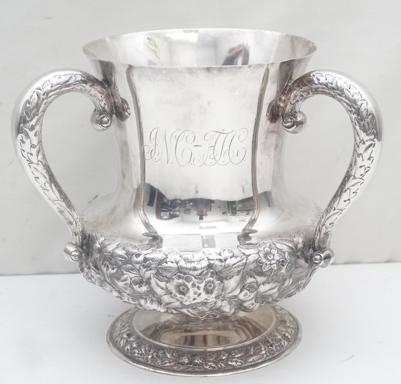 LARGE HENNEGAN & BATES STERLING REPOUSSE LOVING CUP: Large American Sterling Silver Repousse Loving Cup. 9 1/2"x8 3/4". Approximate Siver Weight 1305 grams. Monogrammed for Johnson Newlon Camden (1828-1908) and Ann G. Thompson (1834-1918). Engraved date