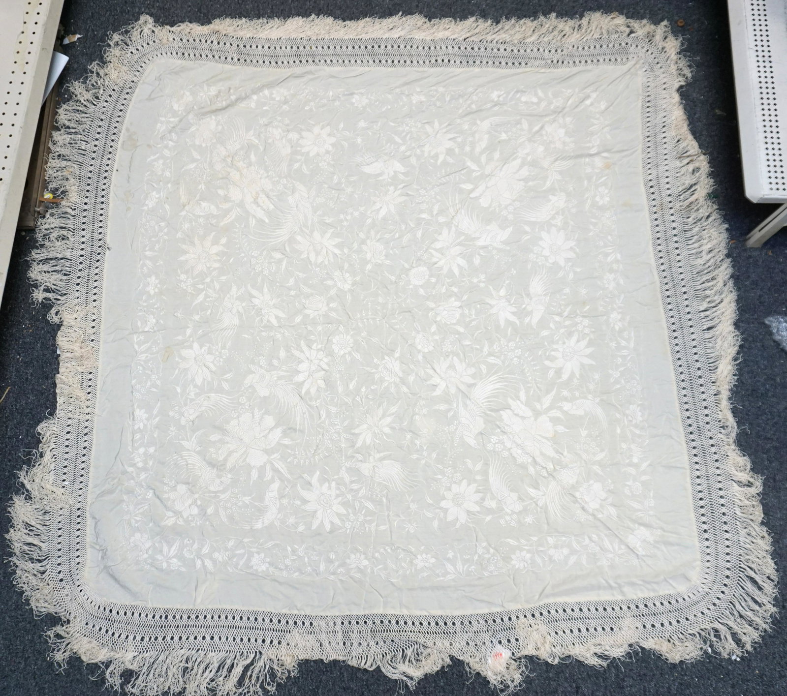 CHINESE QING DYNASTY EMBROIDERED SILK PIANO SHAWL: Large Qing Dynasty Chinese Cream Silk Piano Shawl with Stunning Ivory Silk Embroidery Work. Measures approximately 5 Ft x 5 Ft including the silk fringe. Good condition with a few spots. PROVENANCE: F