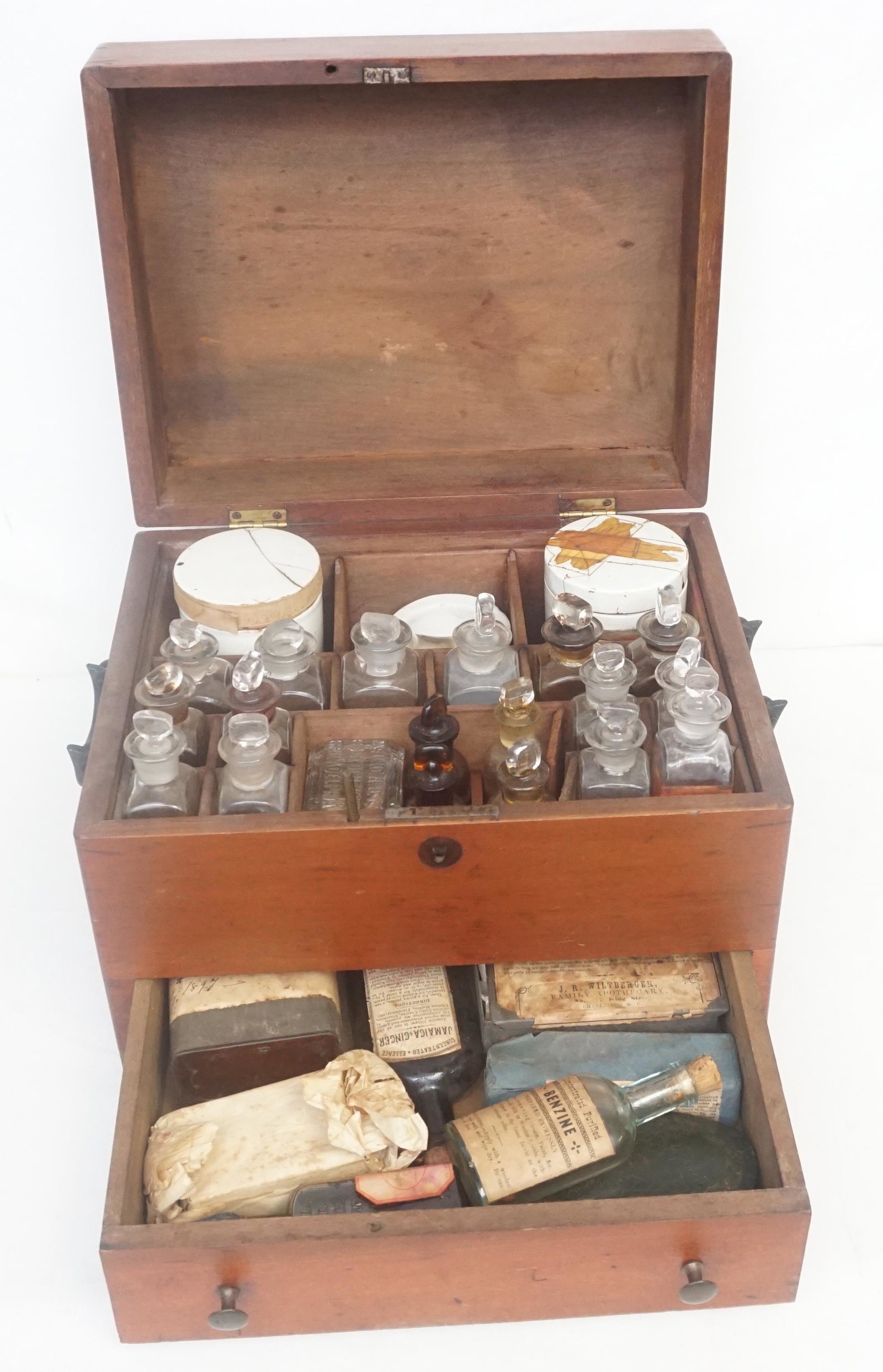 CHARLESTON SC ANTIQUE APOTHOCARY BOX / CASE FILLED: Antique Charleston South Carolina Apothocary Box. Filled with 24 Bottles and other items. Some with old Charleston Pharmacy Labels intact. Box measures 12 1/2"x10"x9". Weight 16 pds 3 oz. NO IN HOUSE 
