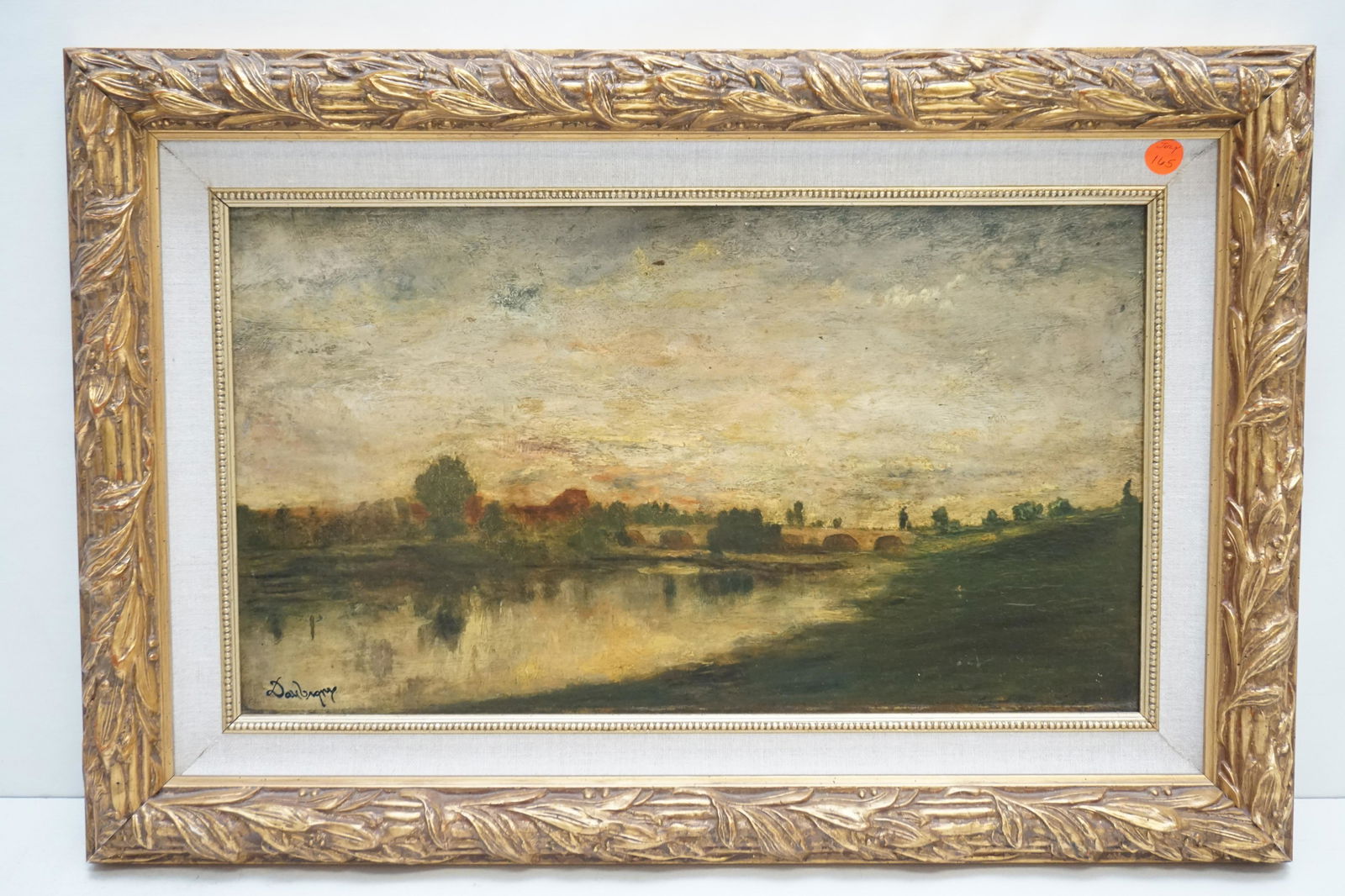 CHARLES FRANCOIS DAUBIGNY (1817-1878 French): Charles Francois Daubigny (1817-1878 French) Oil on Panel, signed lower left."Coucher du Soleil Sur La Riviere". In carved gilt wood frame with linen liner. Panel 18 1/2"x10 1/2". In Frame measures 24