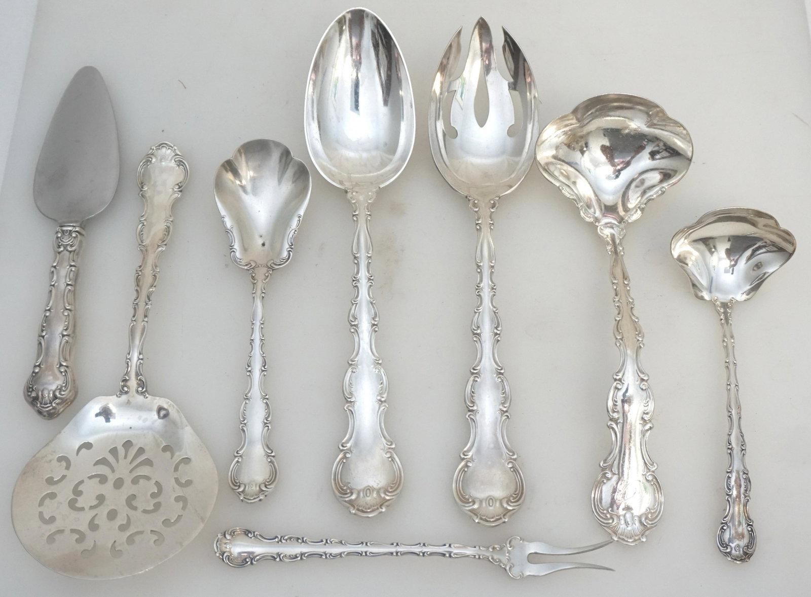 8 pc GORHAM STERLING STRASBOURG SERVING: 8 Gorham Sterling Silver Serving Pieces in the Strasbourg Pattern. 1 Tomato Server 7 1/2" no monograms. 1 Serving Spoon 8 1/2" no monograms. 1 Pierced Tablespoon 8 1/2", no monograms. 1 Solid Gray Lad