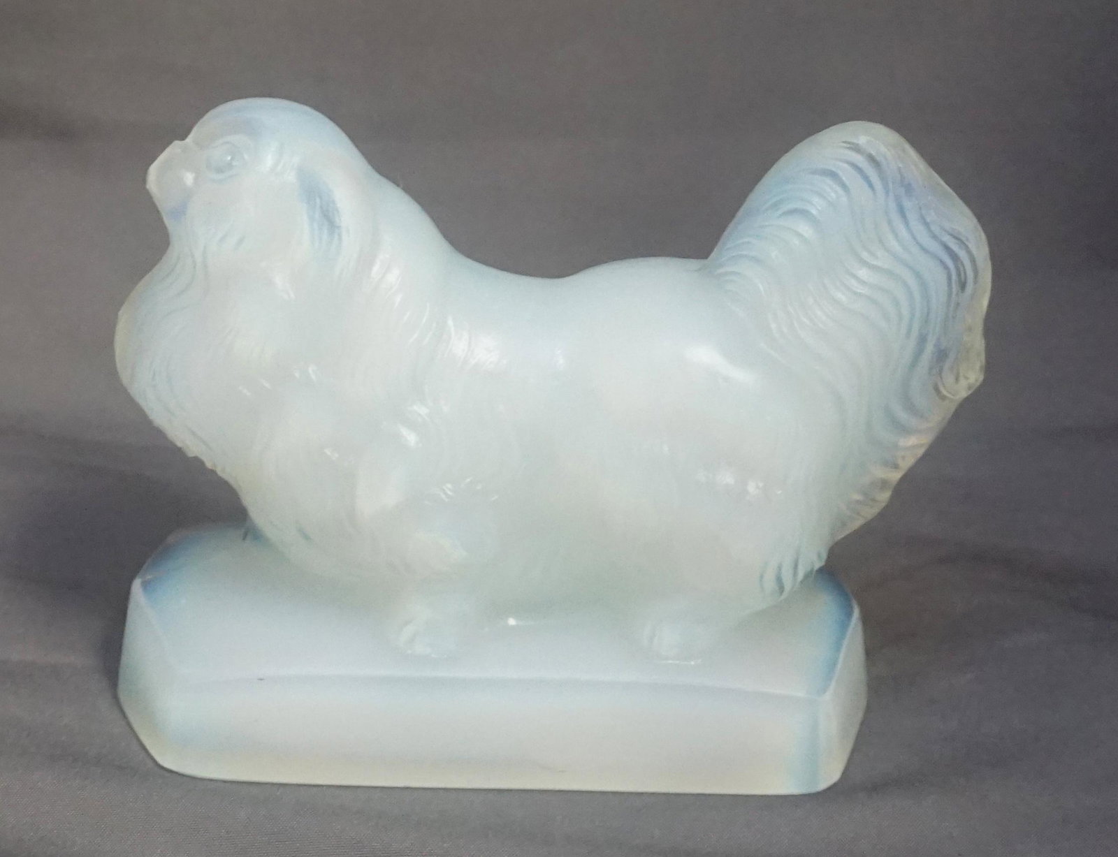SABINO OPALESCENT PEKINESE DOG: Sabino Art Glass Opalescent Crystal Pekinese Dog 4"x3". Signed and with label. Weight 12 oz. PROVENANCE: A Private Charleston SC Estate.