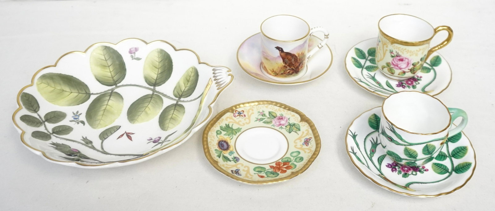 8 PC ROYAL WORCESTER BOWL - CUPS & SAUCERS: All are fine Royal Worcester in very good condition. Bowl "the Blind Earl" 8 1/2"x8". 1 cup 2 saucers "the Blind Earl". 1 Cups & Saucers English Flowers. Weight on all combined 2 pds 5 oz. PROVENANCE: