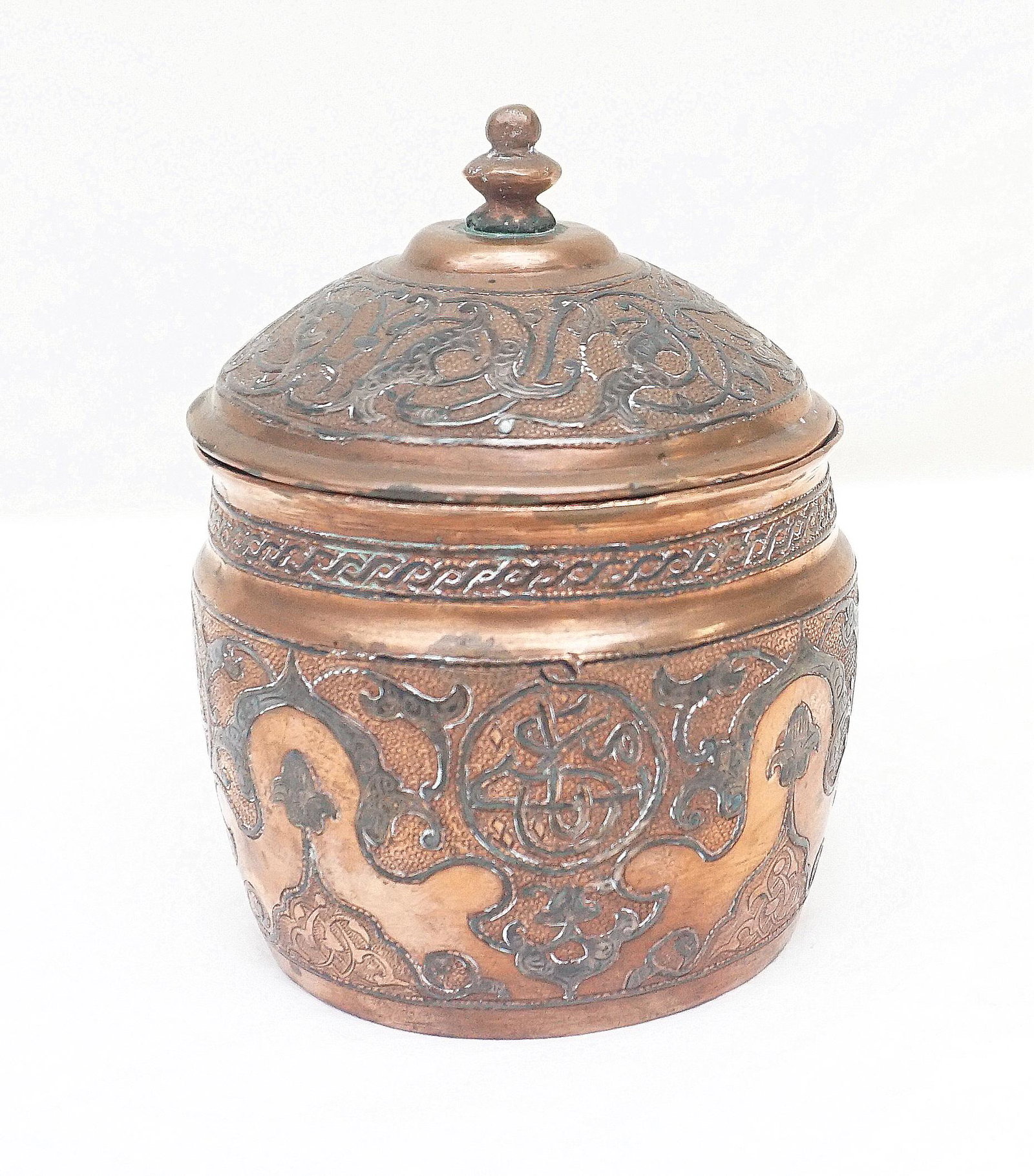ARABIC COPPER HUMIDOR / CONTAINER: Antique Arabic Copper Lidded Container / Humidor. Measures 3 3/4"x3 3/4"x5 1/2". Weight 1 pd 7 oz. PROVENANCE: A Private Charleston SC Estate.