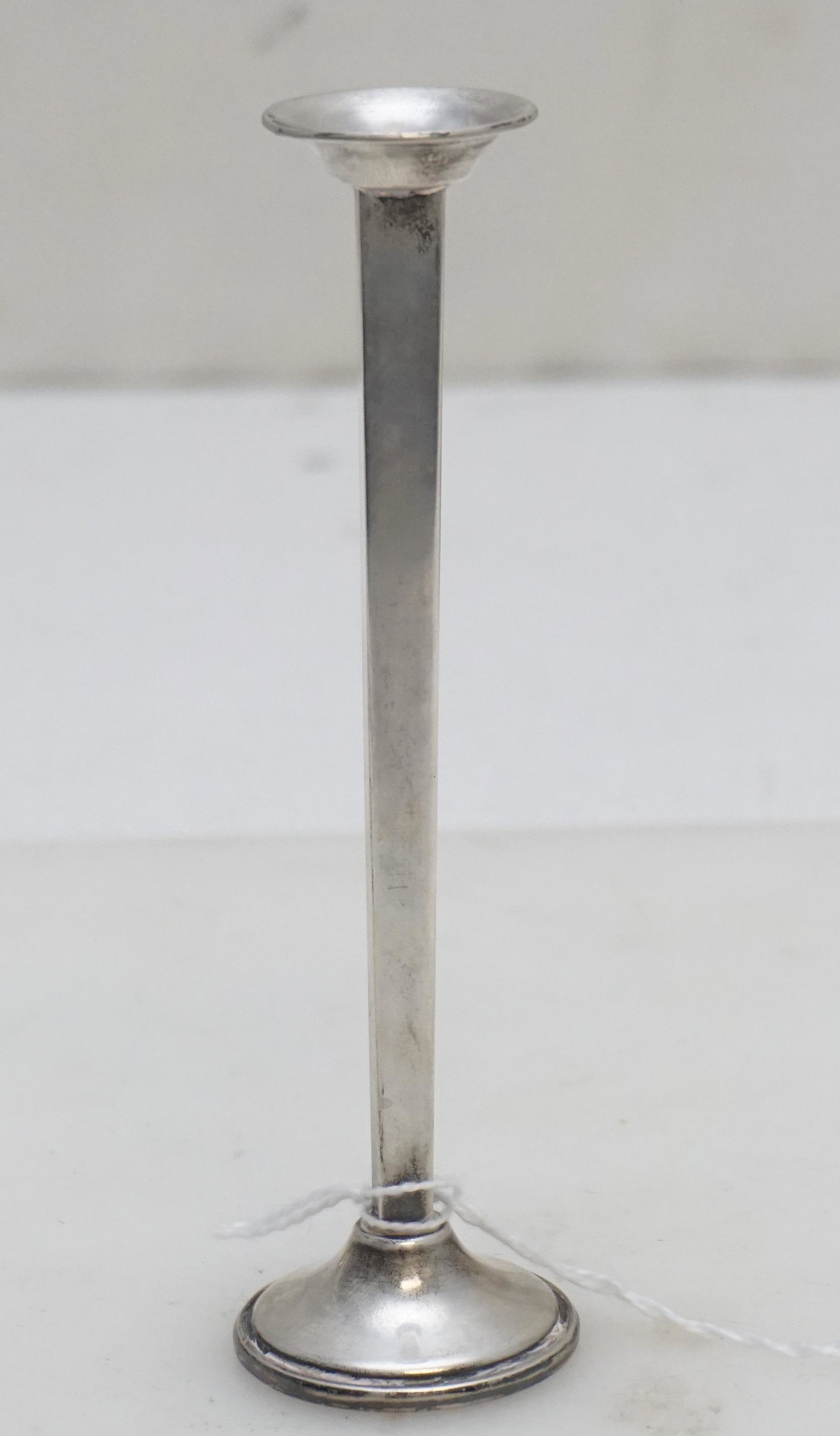 CARTIER SMALL ART DECO STERLING SILVER BUD VASE: Art Deco Sterling Silver Cartier Bud Vase. 5.5". With weighted base, paneled sides. Weight approx 35 grams including weighted base. ***PROVENANCE: From the collection of Rear Admiral William Henry All