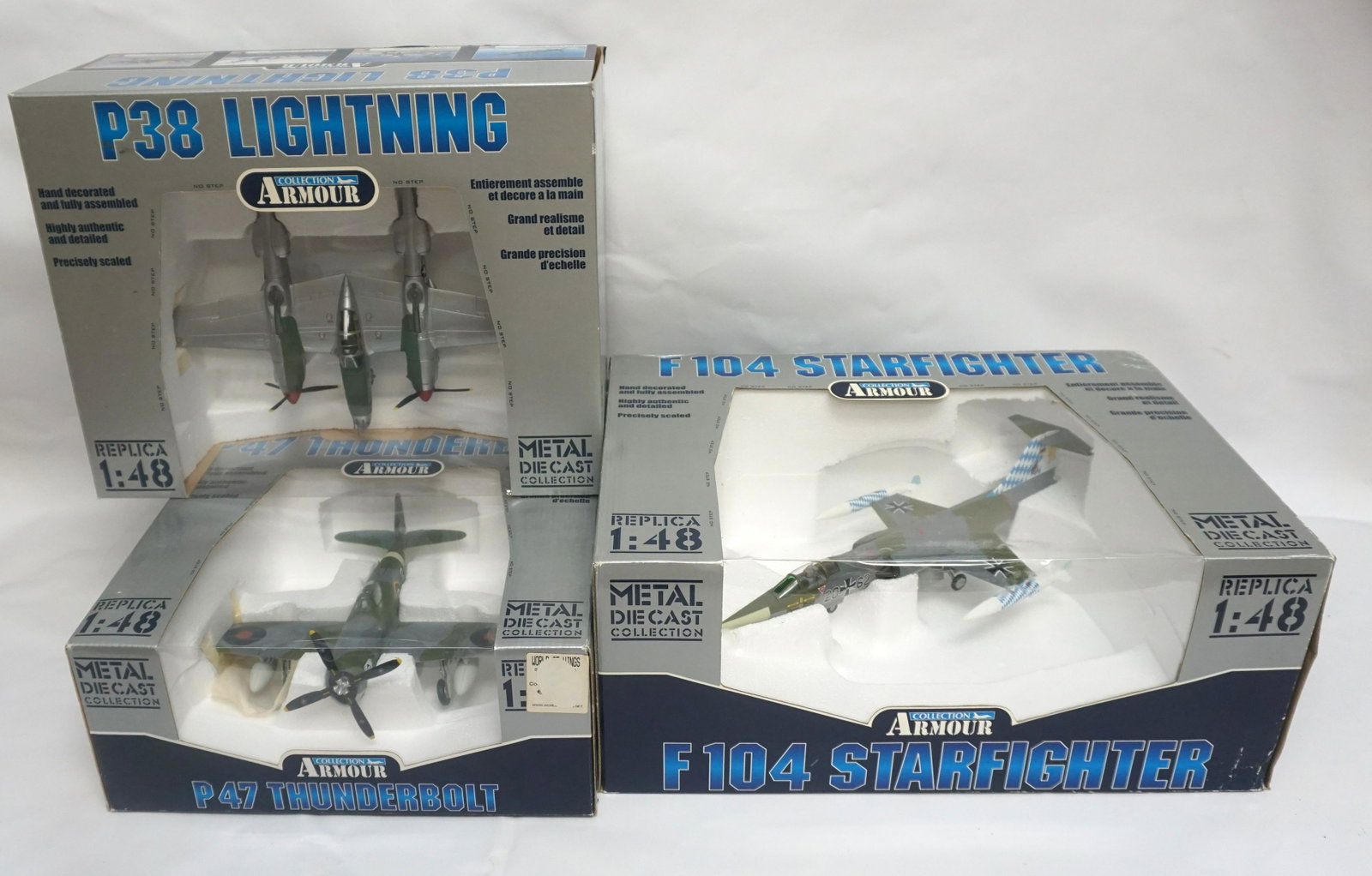 3 FRANKLIN MINT ARMOUR COLLECTION 1:48 SCALE DIECAST: Three Franklin Mint Armour Collection 1:48 model planes in original boxes. Includes: 1.) F 104 Starfighter model B11B477 2.) P38 Lightning model 98114 3.) P 47 Thunderbolt model 98149. Total weight 9 