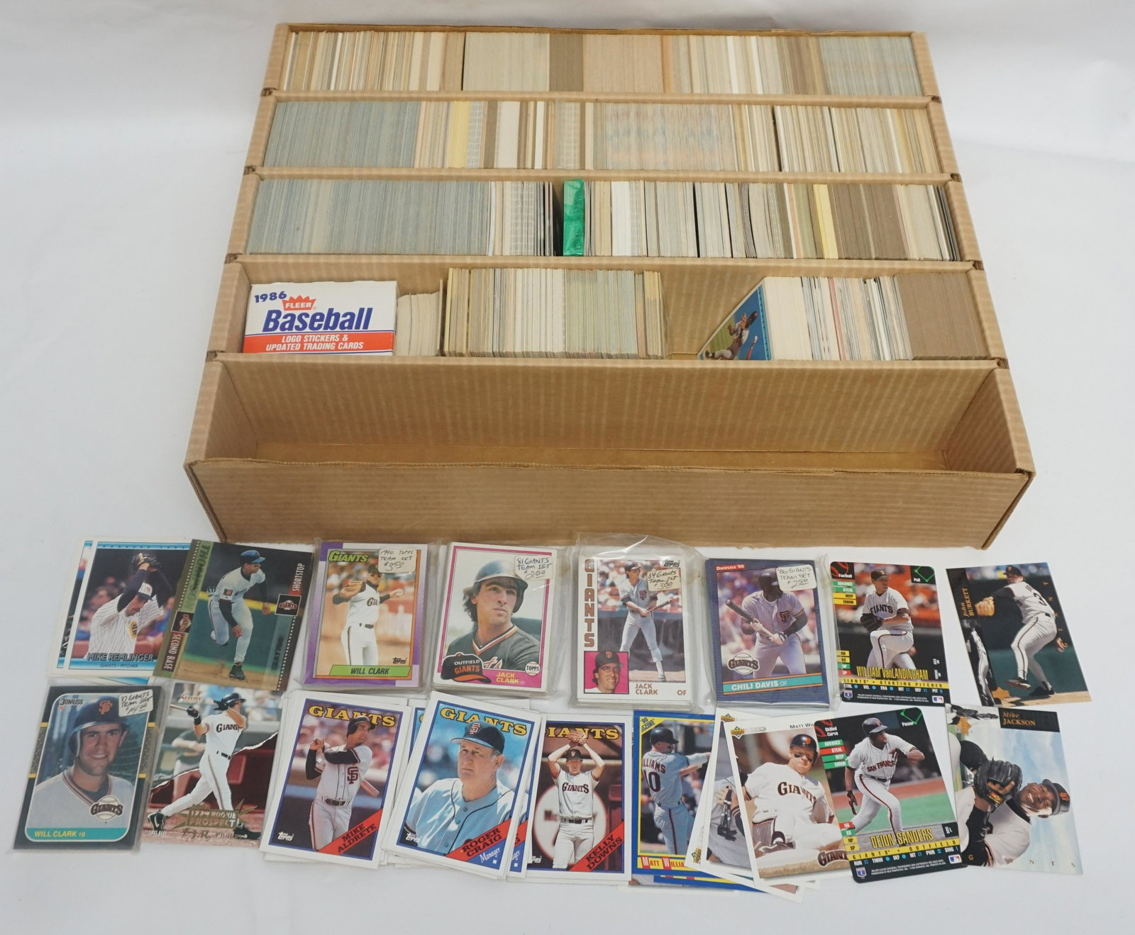 LARGE LOT OF GIANTS MAJOR LEAGUE BASEBALL CARDS: Large lot of new old stock MLB 80-90's player cards. Star players include: Barry Bonds, Matt Williams, Will Clark & More. Total weight 17 lbs. Inhouse shipping not guaranteed on this lot