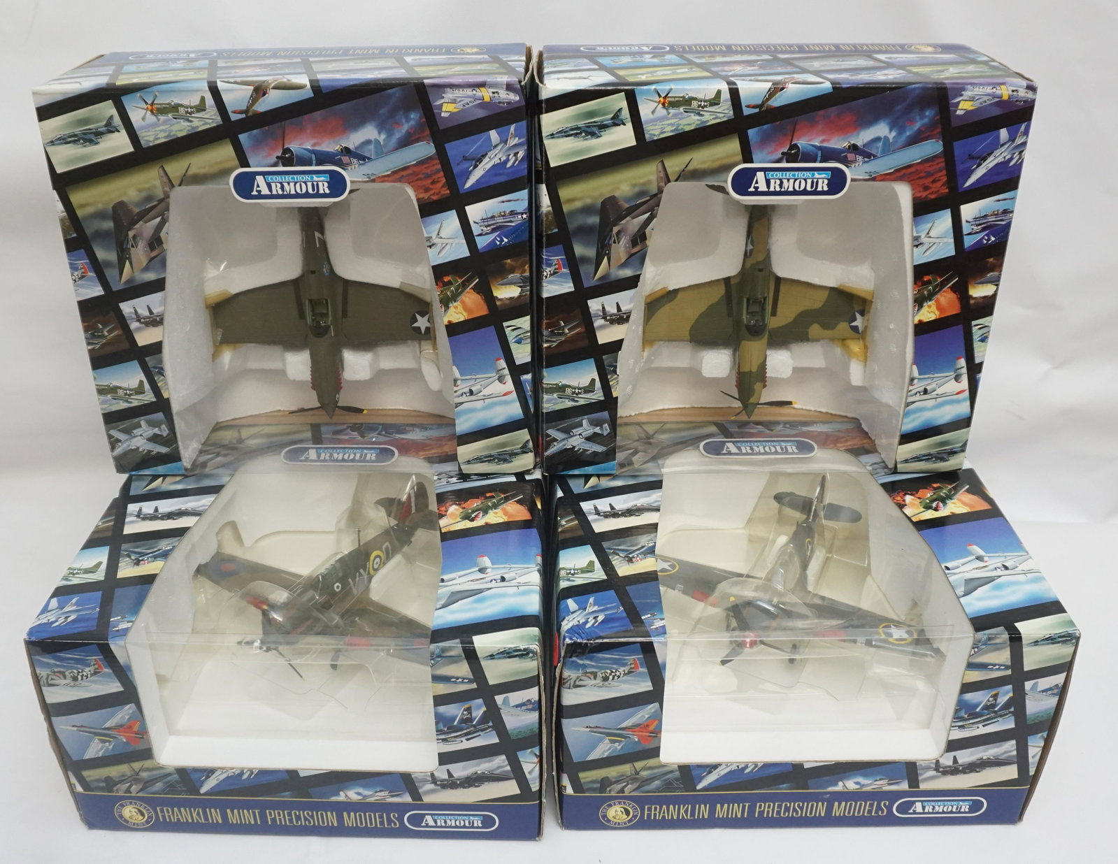 4 FRANKLIN MINT ARMOUR COLLECTION 1:48 SCALE DIECAST: Lot of 4 Franklin Mint Armour Collection Warhawk and Hurricane 1:48 die-cast planes in original boxes . Models B11B622, B11B619, B11B579 and B11B578. Total weight 9.2 lbs. Inhouse shipping not guarant
