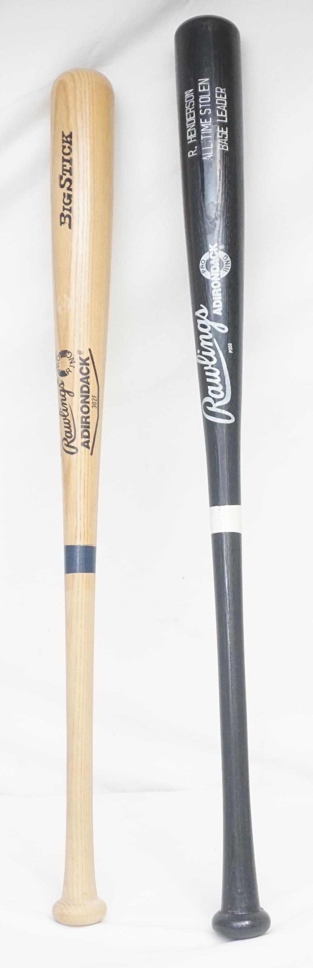 TWO VINTAGE RAWLINGS PRO RING ADIRONDACK BASEBALL BATS: Lot includes a pro ring 302F Big Sick and P302 R. Henderson Rawlings Adirondack bat. Total weight 6 lbs. Inhouse Shipping not guaranteed on this lot.