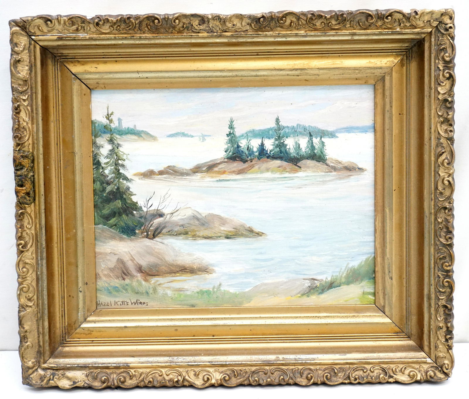 HAZEL KITTS WIRES (1903-1983) VERMONT LANDSCAPE: Hazel Kitts Wires (1903-1983) Oil on Masonite Vermont Lake View. Signed lower left. In wood and gesso frame, Measures 14"x12"x2". Weight 2 pds 12 oz. Known throughout New England for her landscapes an