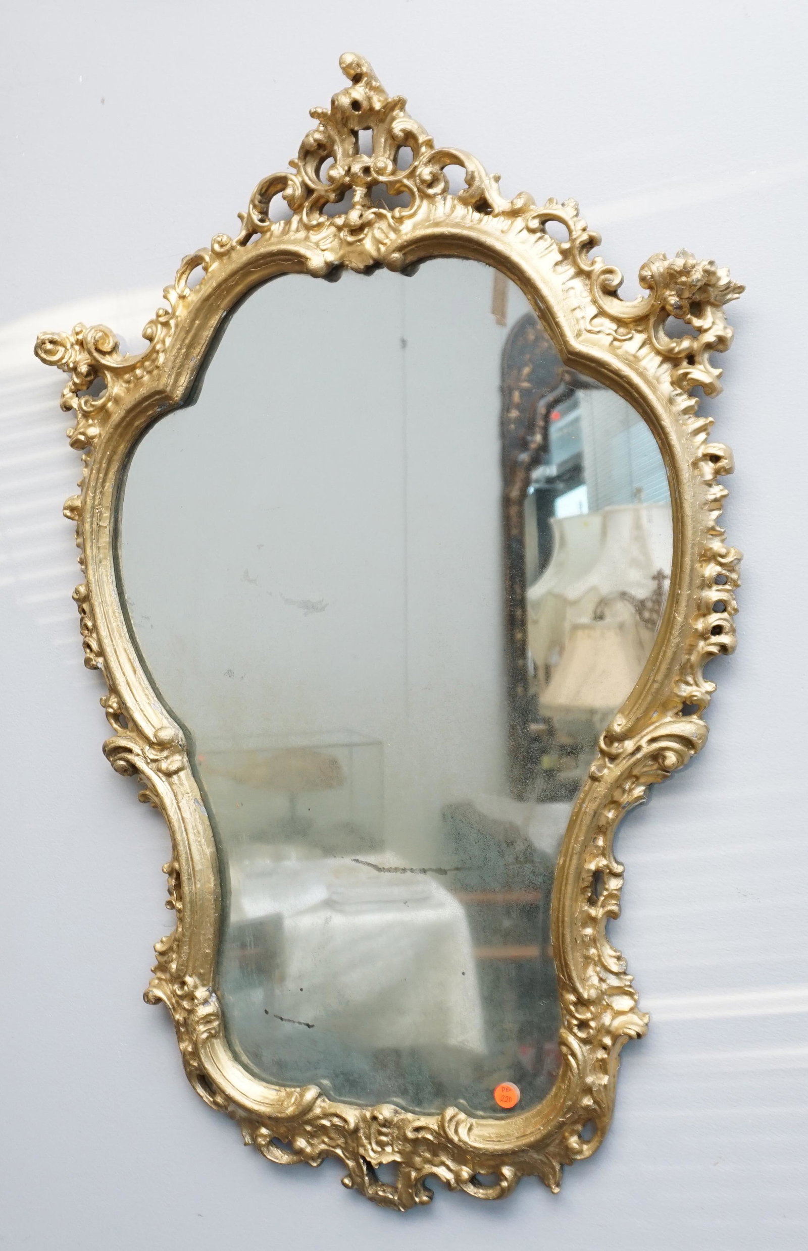 ANTIQUE LOUIS XIV GILT WOOD MIRROR: Antique Louis XIV Gilt Wood Carved Mirror. Measures 38"x25"x2". Weight 21 pds. PROVENANCE: A Private Charleston SC Estate. Shipping on this item offered through, Pak Mail 843-849-0310 - info@charlesto