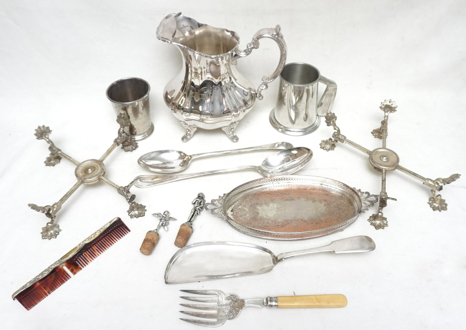 12 pc SILVERPLATE PITCHER: 1- Poole Silverplate Pitcher, monogrammed 9 1/2". 2- Pair of Silverplate Bowl / Plate Holder, made in Japan. 10". 3- Pewter Glass Bottom Mug, monogrammed Yeamans Club. ding.4 1/2". 4- Silverplate Cup 