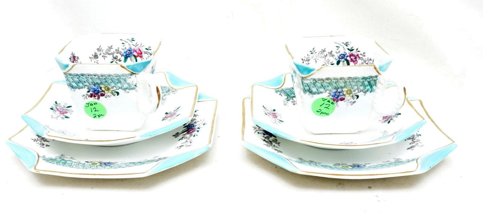 PAIR SAMPSON BRIDGWOOD TEACUP TRIOS: Pair of Art Deco Era English Sampson Bridgwood Teacup Trios. Each set with a Tecup, saucer and cake plate. Weight total 2 pds 5 oz. PROVENANCE: A Private Charleston SC Estate.
