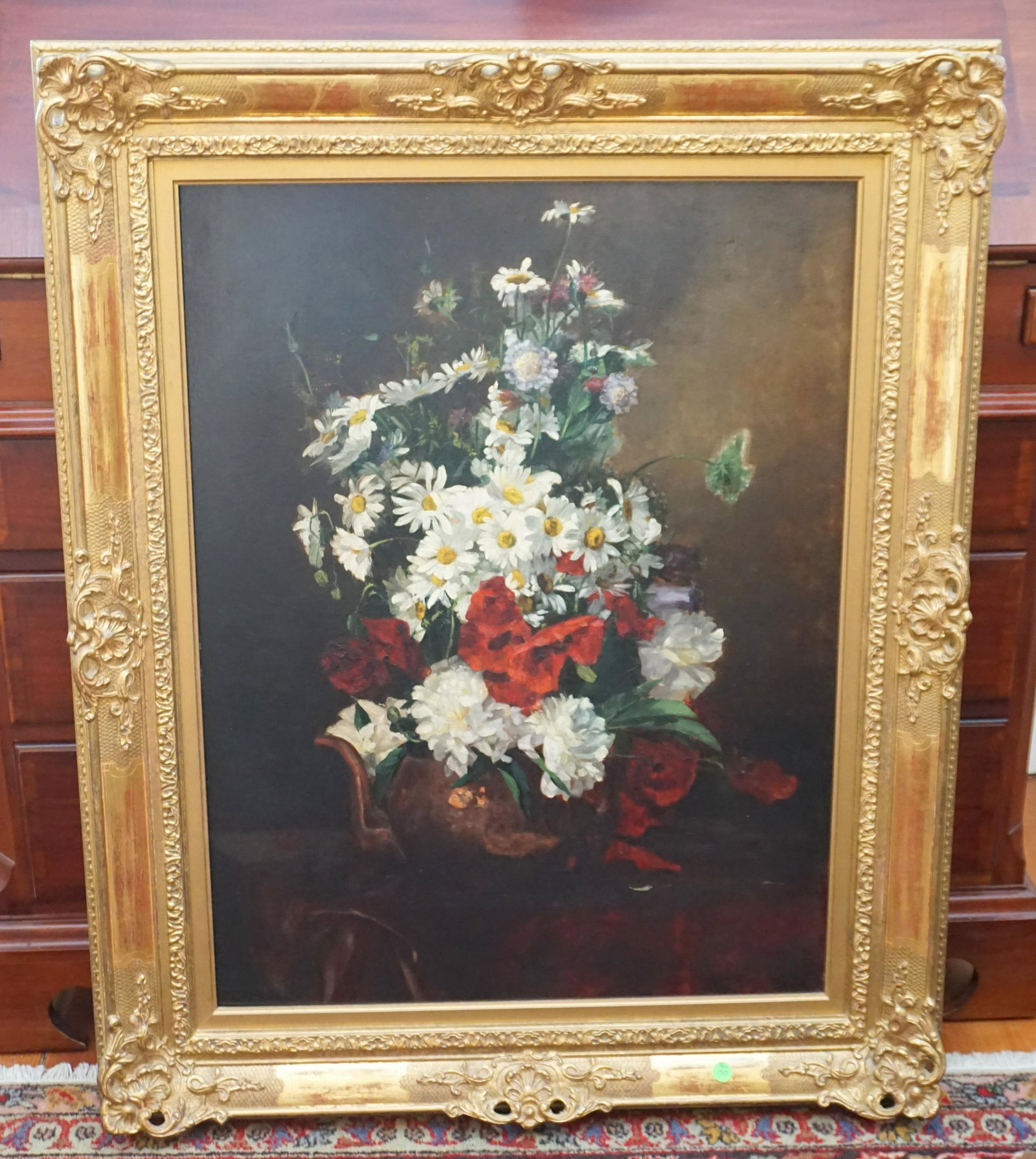 OIL ON WOOD PANEL FLORAL STILL LIFE: 20th century well done Oil on Wood Panel French Floral Still Life after an Old Master. In carved Gilt rococo frame. In frame neasures 31"x42"x2". PROVENANCE: A Society Street, Charleston Private Estat