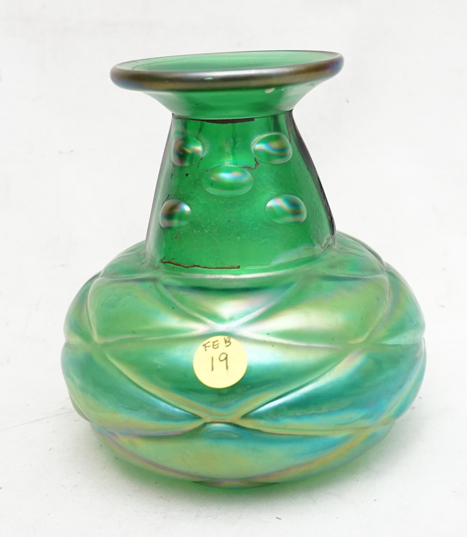 LOETZ STYLE ART GLASS VASE.: Bohemian Iridescent green blown out diamond quilted vase. Measures 5 1/2"x5 1/2"x 6 3/4". Weight 1 pd 12 oz. PROVENANCE: A Private Charleston SC Estate