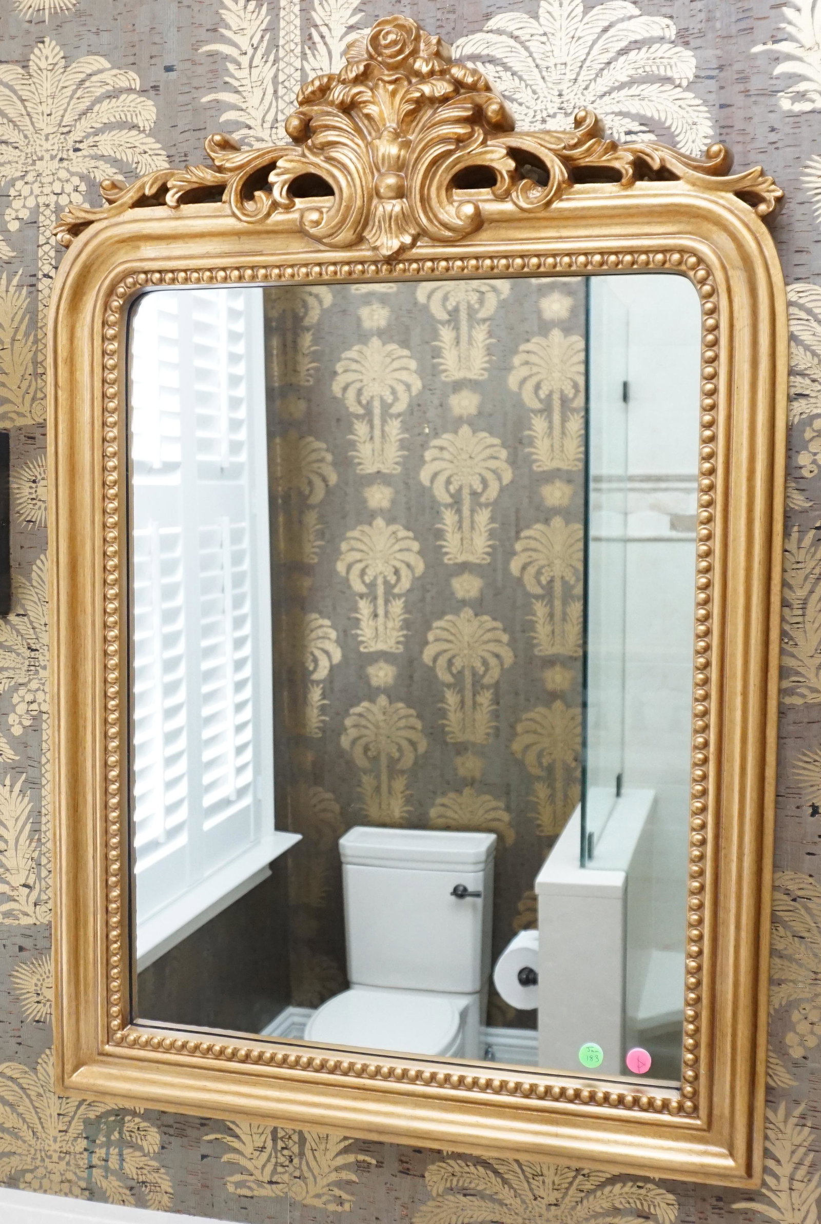 HAMILTON HILLS BAROQUE MIRROR: Hamilton Hills gold baroque style rounded top wall mirror is a timeless classic, offering elegance and old world charm. Measures 24"x36"x2". Weight 14 pds. PROVENANCE: A Society Street, Charleston Pri