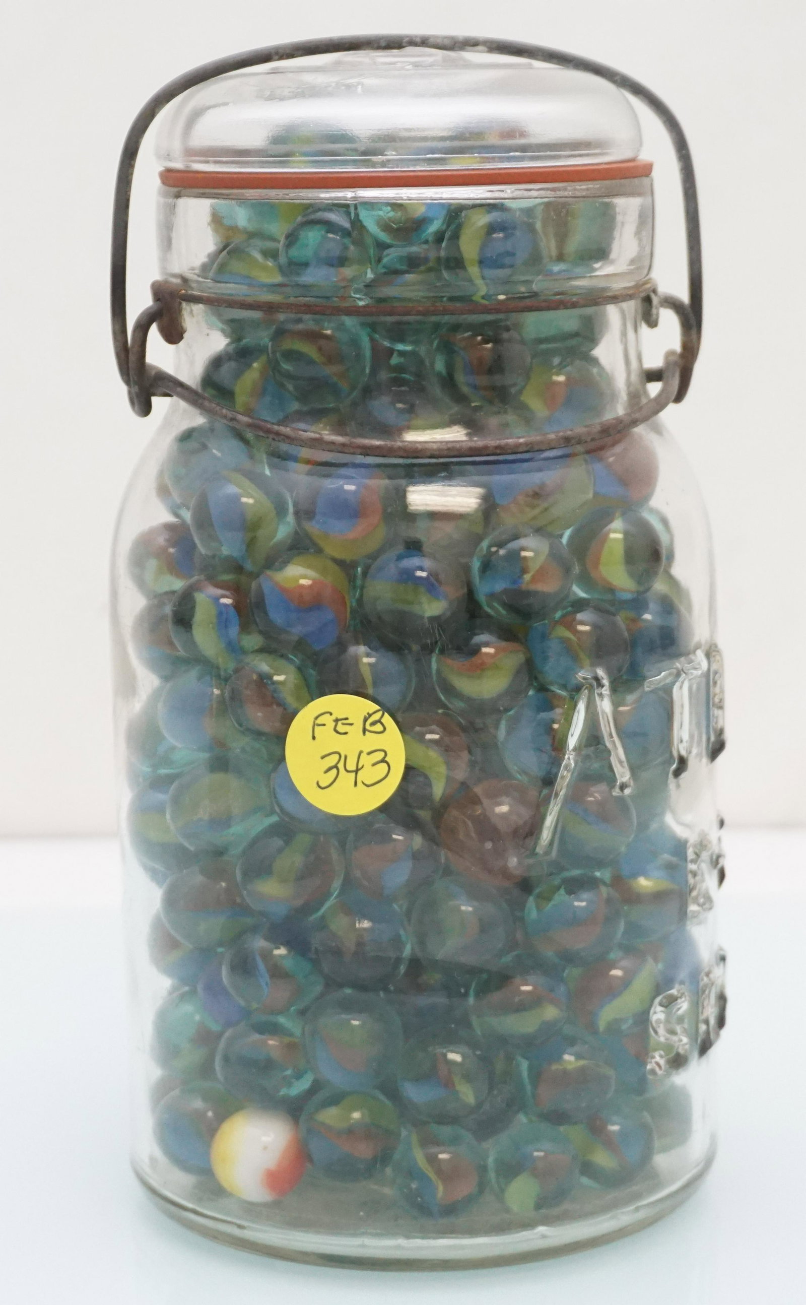 JAR OF CATS EYE MARBLES (1 of 4)