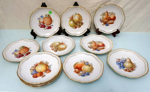 11 SCHUMANN BAVARIA FRUIT PLATES: 11 Schumann Bavaria Reticulated Rim Fruit Plates. Various Fruits. Gilt Rim. 7". Weight 5 pds 9 oz. PROVENANCE: A Private Charleston SC Estate