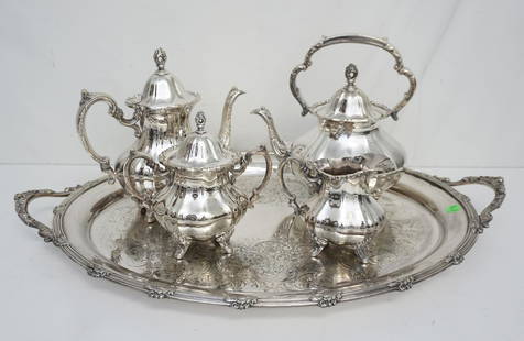 5 PIECE SILVERPLATE TEA SERVICE TOWLE: Towle Silver Plated Tea Service Coffee Pot 9 3/4. Teapot / Kettle 10 1/2", missing stand. Cream and Sugar. In addition there is a large Butlers Tray, maker unknown 28"x18". Weight on all 15 pds.