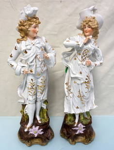 PAIR ANTIQUE GERMAN PORCELAIN FIGURES: Pair of Antique German Porcelain Figurines. Porcelain Bisque and Glazed with Gold Accents. Each 14 1/2". Weight combined 3 pds. PROVENANCE: A Private Charleston SC Estate. NO IN HOUSE SHIPPING.