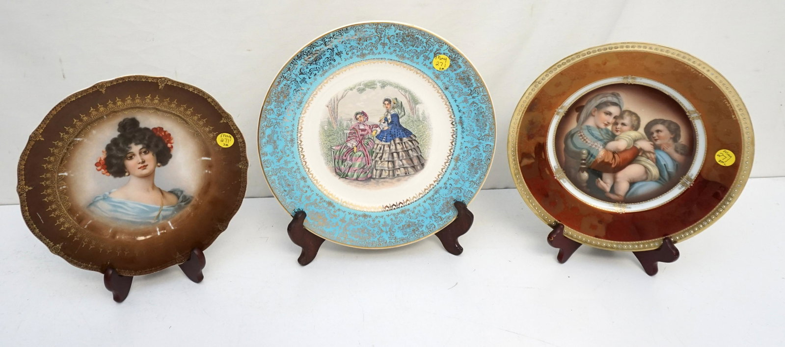 3 ANTIQUE PICTORIAL PORCELAIN PLATES: 1- Madonna & Child, beehive mark. 10". 2- Carl Tielsch Portrait Plate 9 1/2", some wear. 3- Century by Salem Fashion Ladies with 23kt gilt 10 1/2", good condition. Weight on all 3 pds 7 oz. PROVENANCE