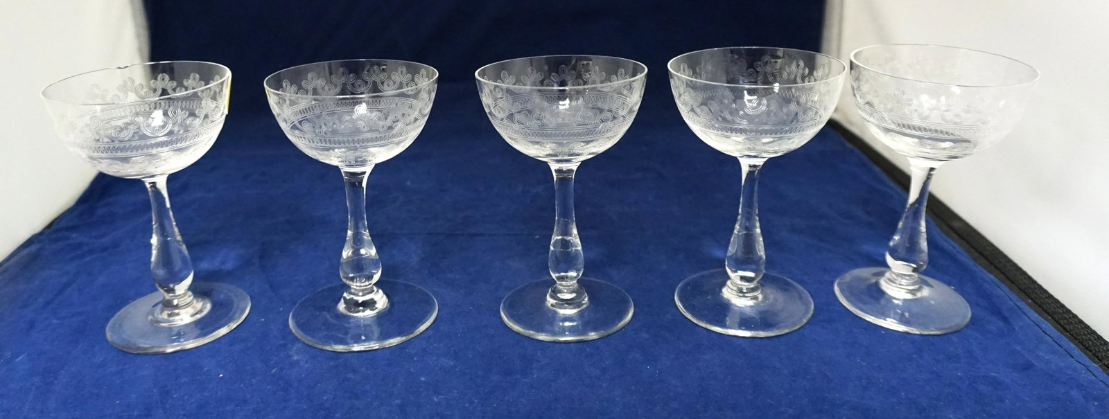 5 FOSTORIA SMALL CLOVERLEAF WINE GLASSES: 5 Antique Fostoria Elegant Etched "Cloverleaf" Wine or Cordial Glasses. 4 1/4". Weight on all 1 pd. PROVENANCE: A Charleston Private Estate.