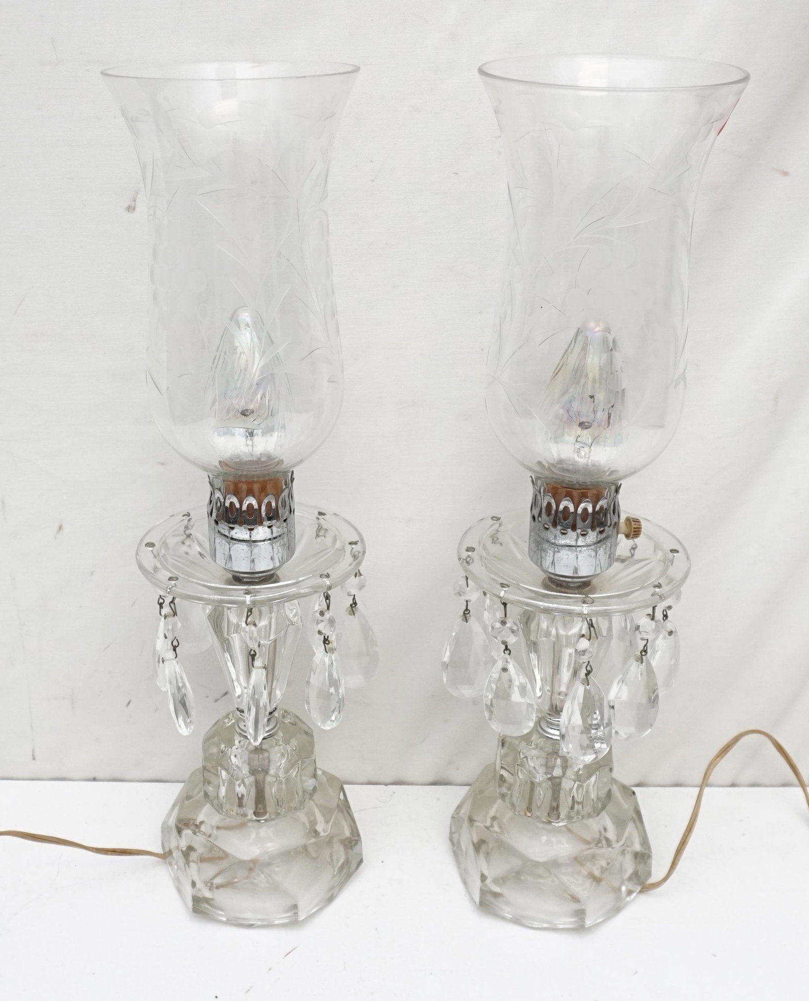 PAIR ELECTRIFIED GLASS LUSTERS WITH ETCHED SHADES: Matched Pair of Electrified Glass Lusters. Both with etched berry and Foliage Shades. Each 18" to top of shade. Weight combined 8 pds 4. oz. PROVENANCE: A Kiawah Island Private Estate. NO IN HOUSE SHI