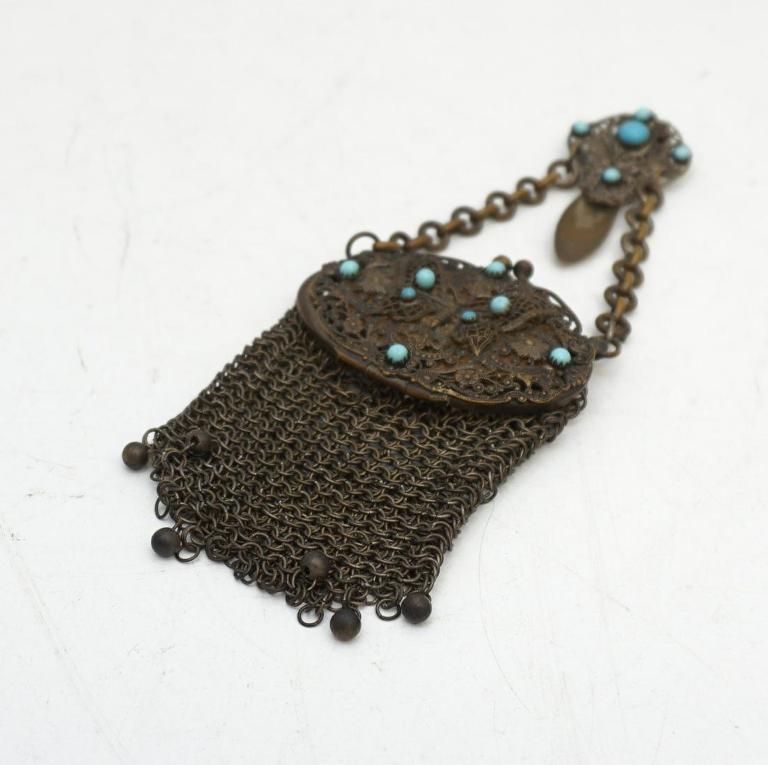 ART NOUVEAU BUTTERFLY MESH CHATELAINE PURSE: Antique Art Nouveau Mesh Chatelaine purse Filigree Butterfly blue cabochons chain mail. The interior with an oval beveled mirror. Measures 3 1/4" wide x 5" Weight 3.1 oz. PROVENANCE: A Charleston Priv
