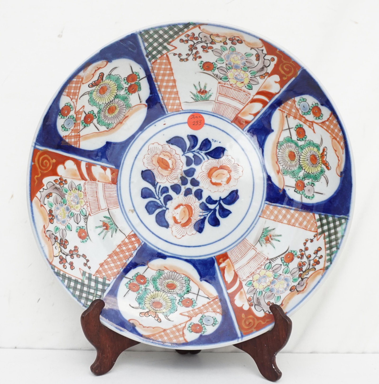 LARGE JAPANESE IMARI CHARGER: Colorful Large Japanese Imari charger with center floral designs in cobalt blue and rust colors. 13.5" diameter good condition. Weight 4 pds. PROVENANCE: A Charleston Private Estate.