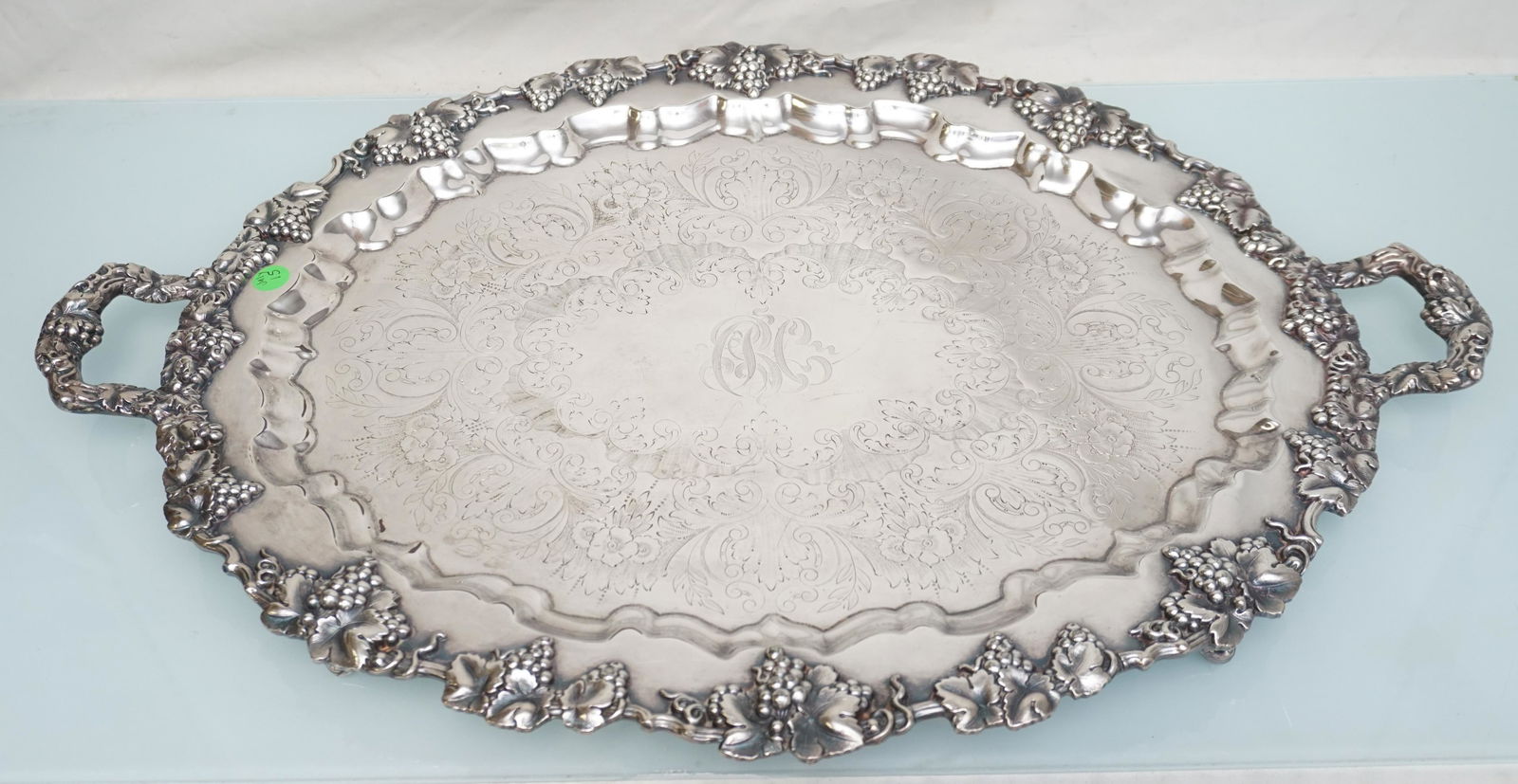 MONUMENTAL SHEFFIELD SILVER ON COPPER TRAY: Monumental English Sheffield Silver on Copper Butlers TRay. Measures 27"x19". Rococo Etched Flora and Fauna. Handles and Rim covered in Repousse Grapes and Vines. Weight 8 pds. PROVENANCE: A South Car
