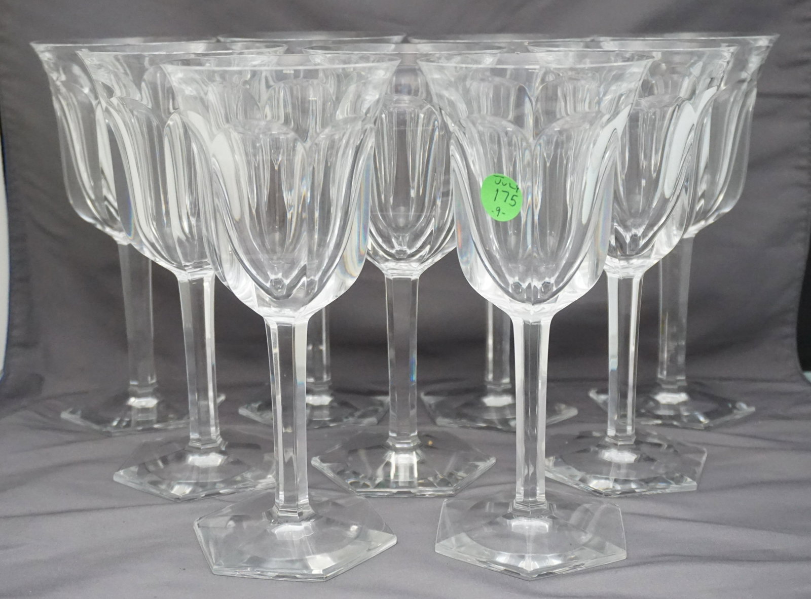 9 BACCARAT MALMAISON TALL WATER GOBLETS: Nine (9) Vintage Baccarat Claret Wine Glasses in the "Malmaison" Pattern. Each 3 3/4"x8 1/2". 1 with a tiny flea bite to rim. Weight combined 10 pds. PROVENANCE: 25 East Battery, Charleston SC. The Ch