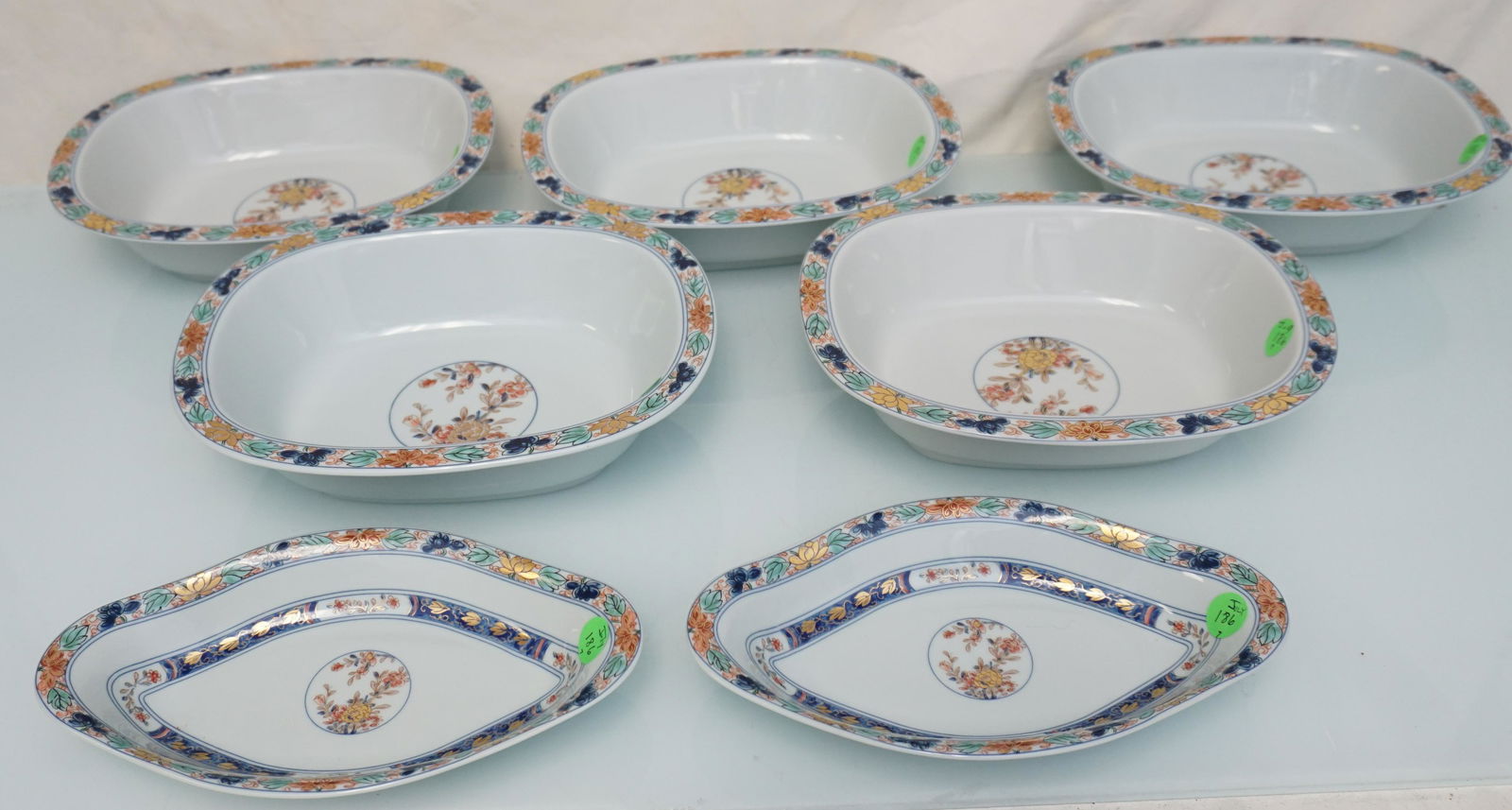 7 RAYNAUD LIMOGES KOUTANI (CELADON) VEGETABLE & RELISH BOWLS: Seven (7) Scarce and Hard to Find Raynaud Limoges France "Koutani" (Celadon Background) Oval Vegetable Bowls and Relish Bowls. 5 Oval Vegetables 9 1/2". 2 Relish 9". Weight 9 pds. PROVENANCE: 25 East