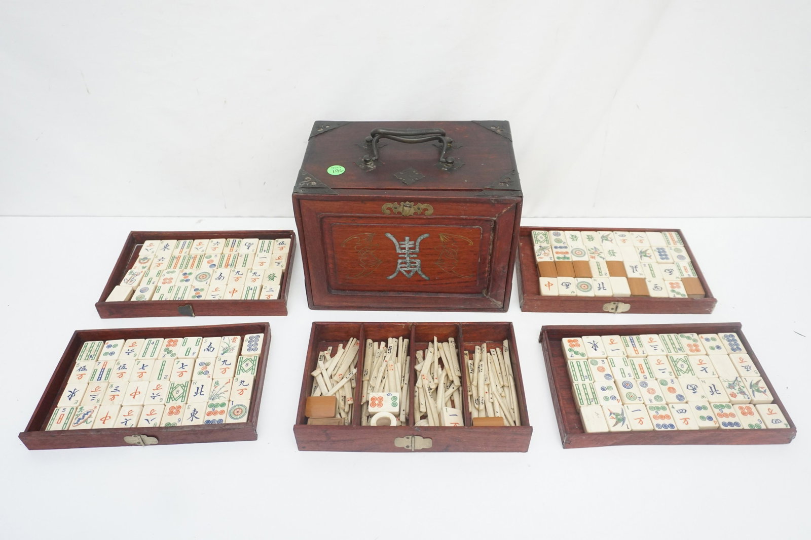 1920s CHINESE MAHJONG CASED SET: Vintage 1920s Chinese Mahjong Cased Set 148 Bone and Bamboo Tiles, Small Dice,120 Scoring Sticks. All in Rosewood slide front Case. Case 9 1/2"x6 1/2"x7". Weight 6 pds. PROVENANCE: A Charleston, SC Pr